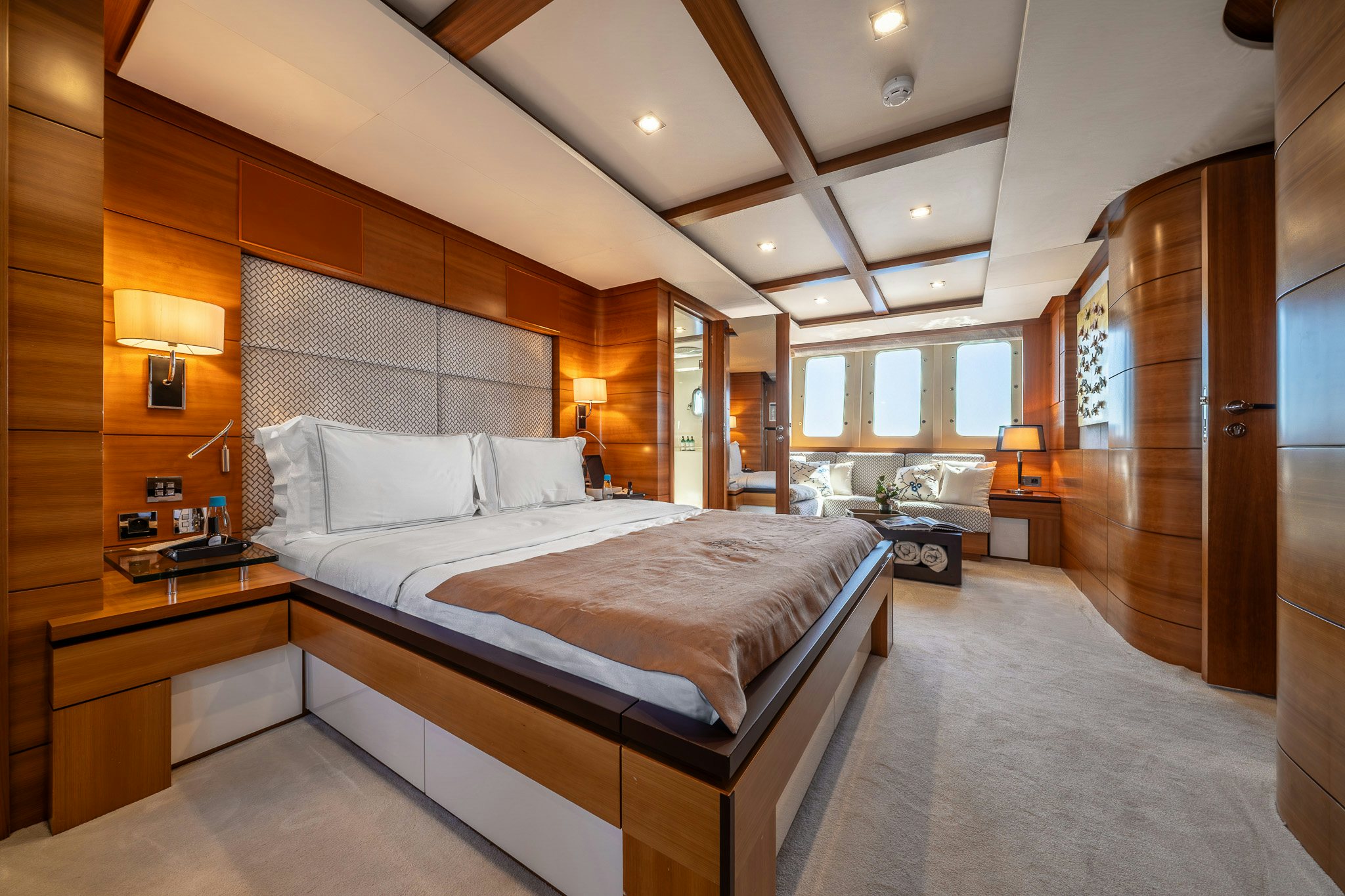 a room with a bed and a wood door aboard ARION Yacht for Sale