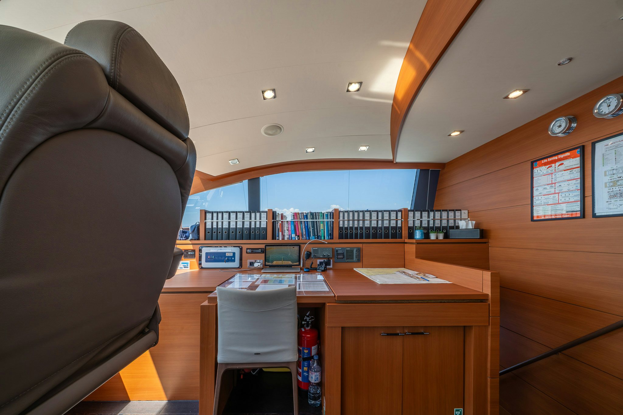 a room with a desk and a chair aboard ARION Yacht for Sale