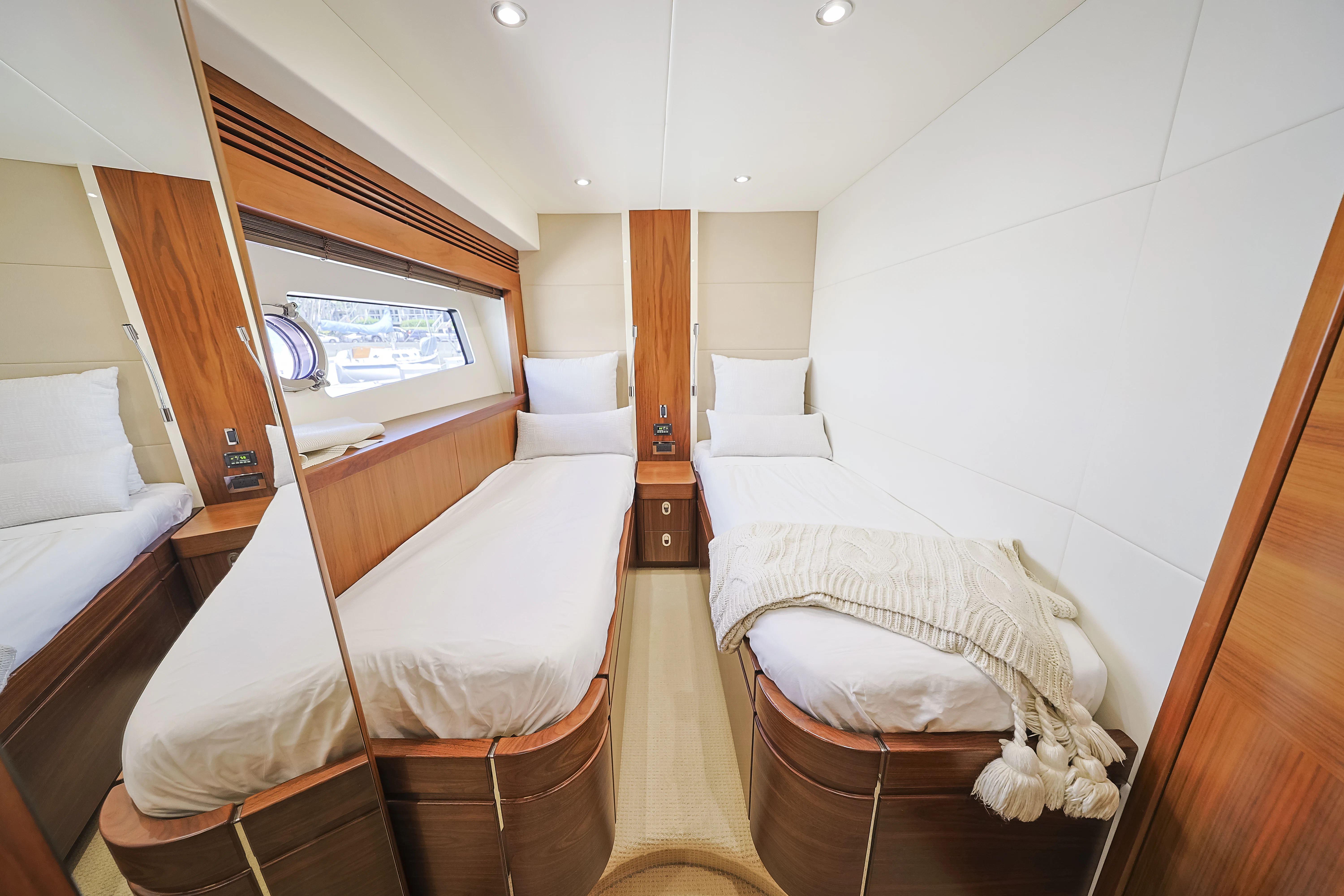 a room with two beds aboard SEA LA VIE Yacht for Sale