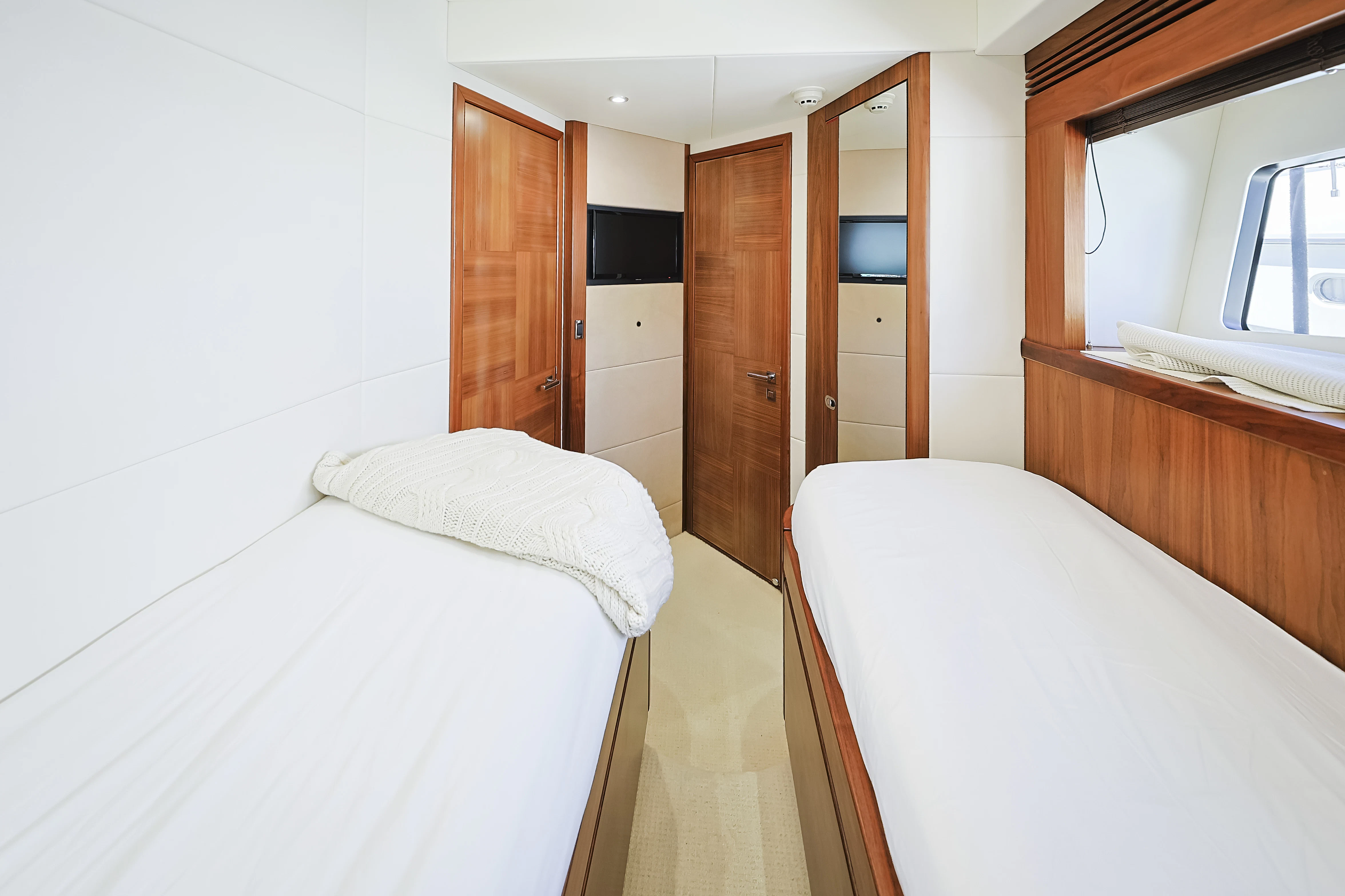 a room with two beds aboard SEA LA VIE Yacht for Sale