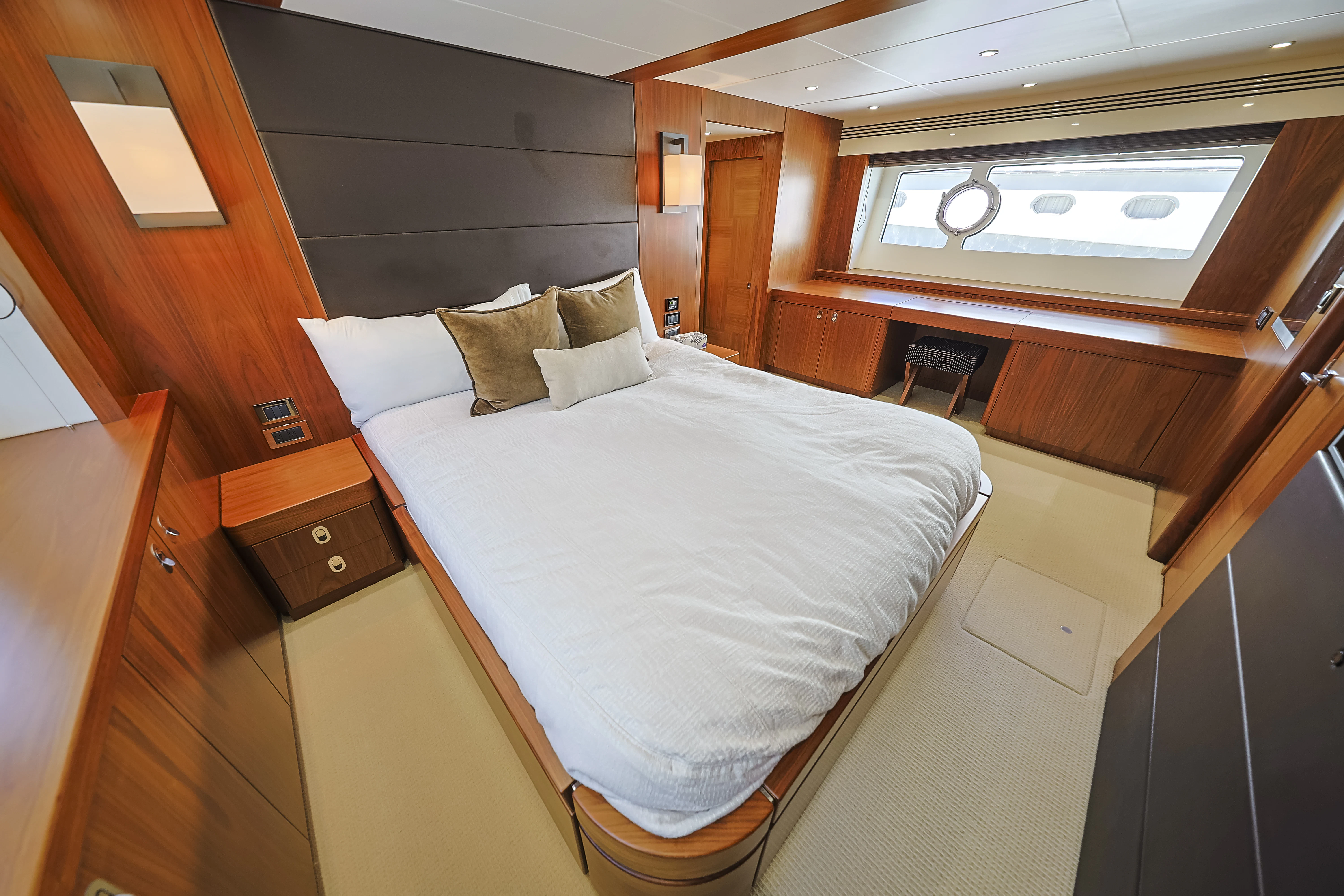 a bed in a room aboard SEA LA VIE Yacht for Sale
