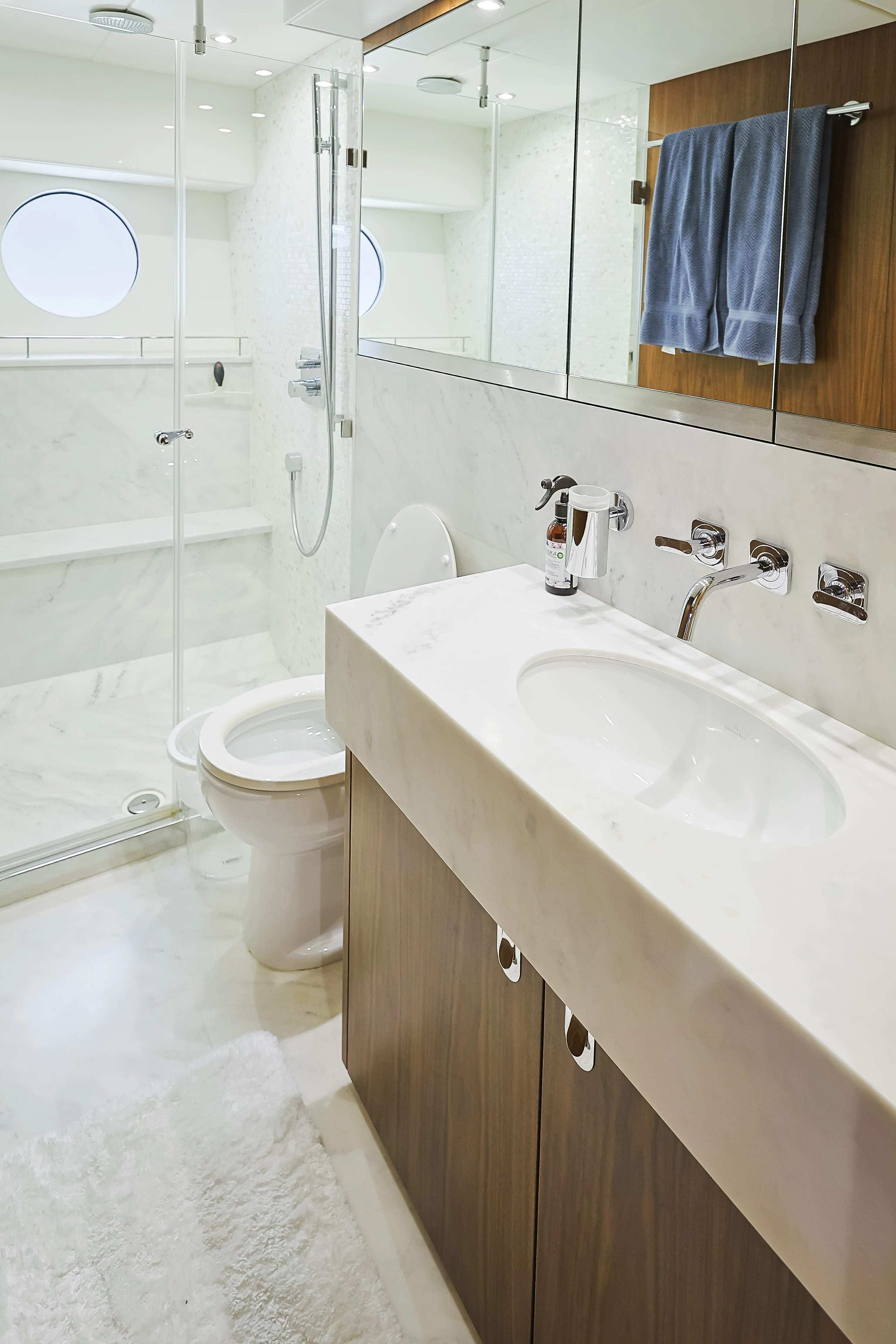 a bathroom with a sink toilet and bathtub aboard SEA LA VIE Yacht for Sale