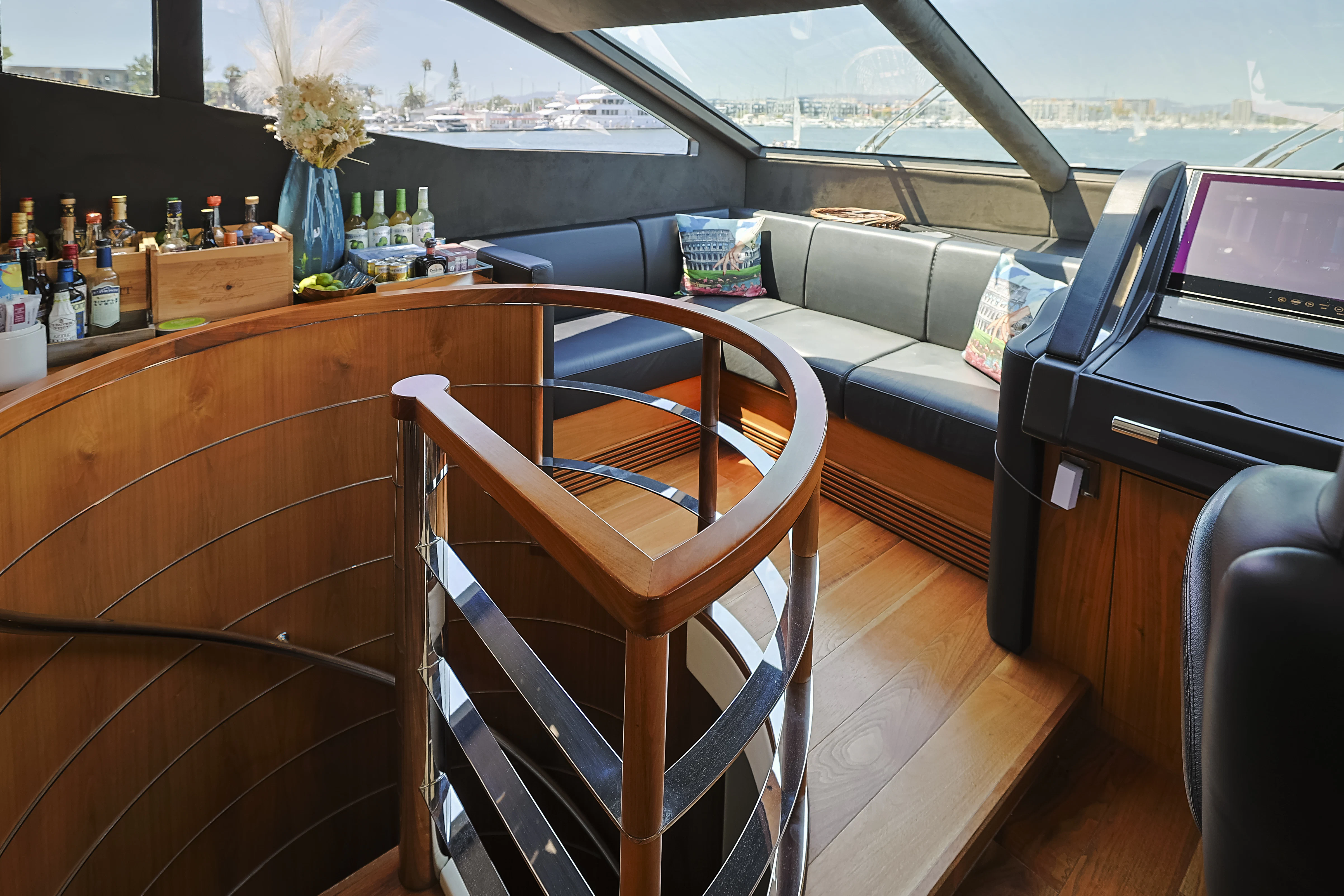 a room with a couch and a piano aboard SEA LA VIE Yacht for Sale