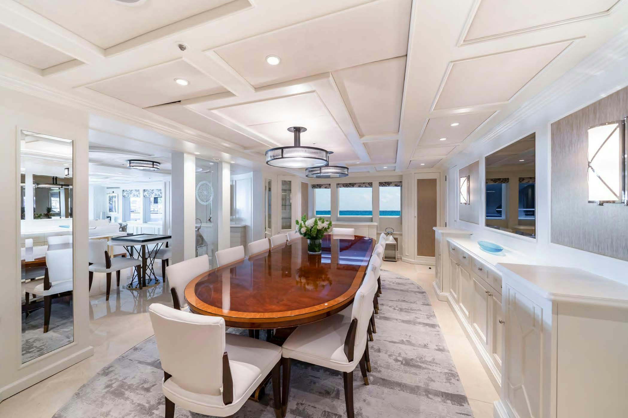a large open plan living room aboard MOSAIQUE Yacht for Sale