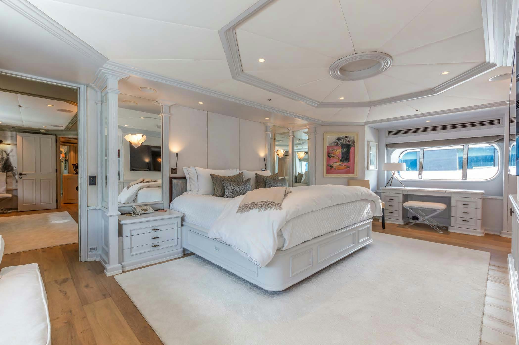 a large bedroom with a large bed aboard MOSAIQUE Yacht for Sale