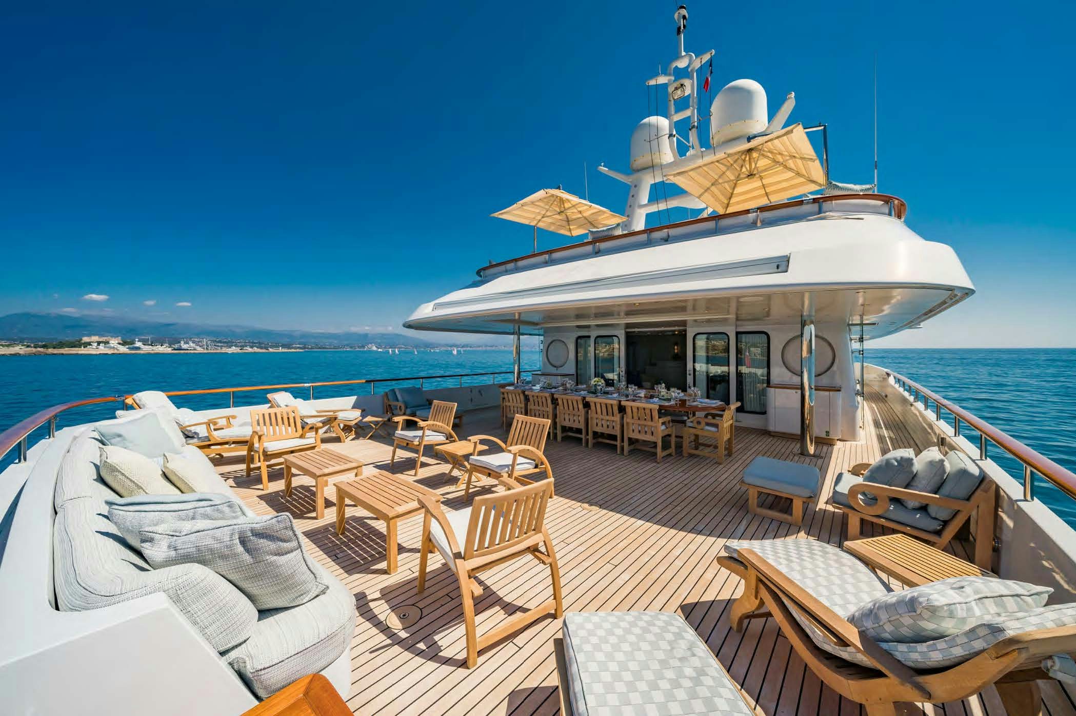 a boat on a water body aboard MOSAIQUE Yacht for Sale