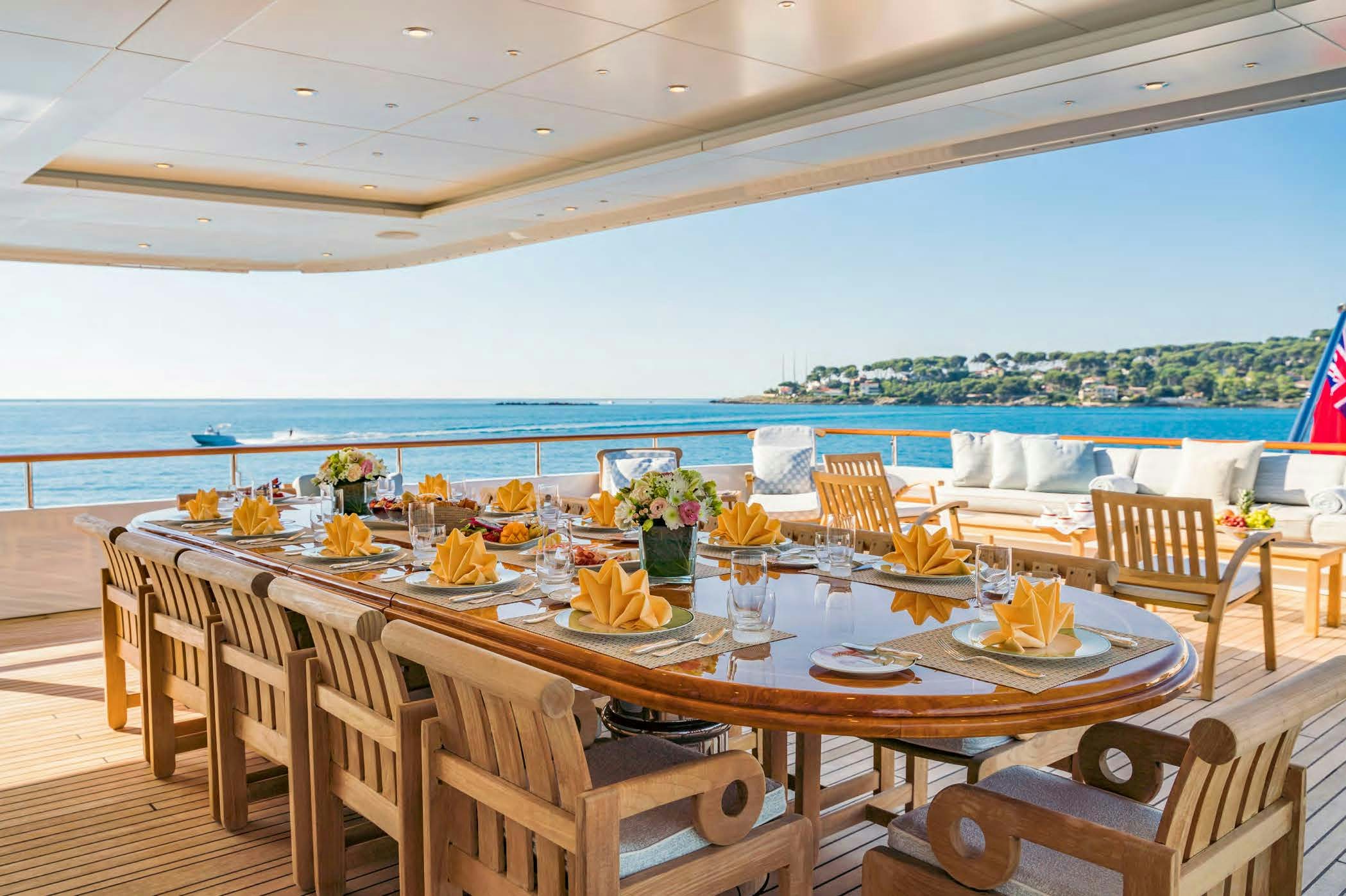 a table set for a meal aboard MOSAIQUE Yacht for Sale
