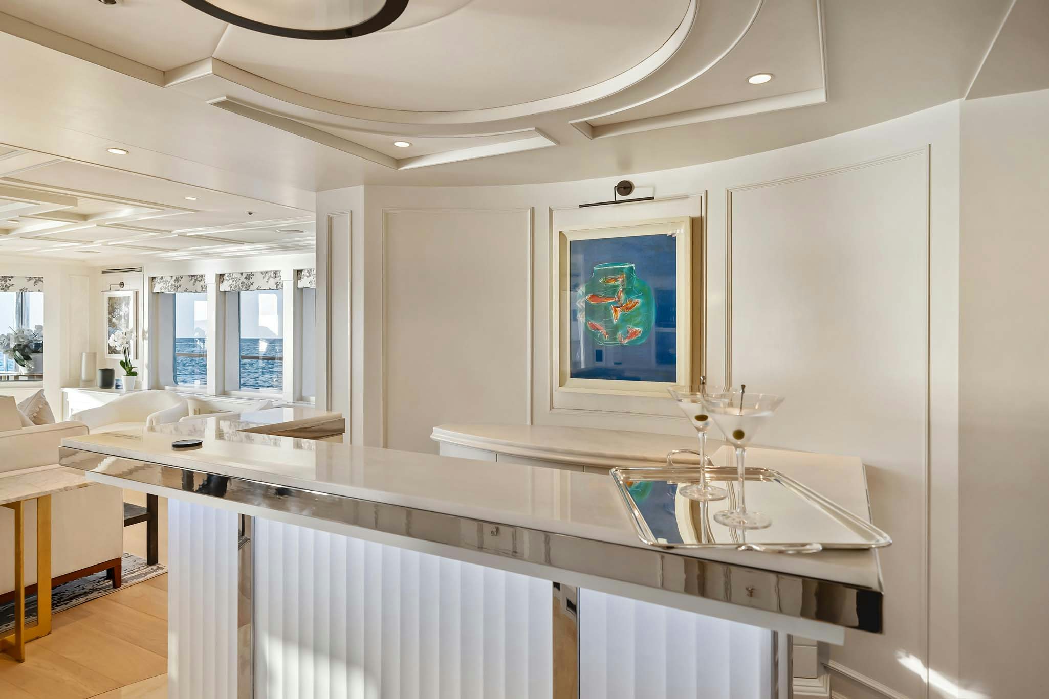 a large kitchen with a large island aboard MOSAIQUE Yacht for Charter
