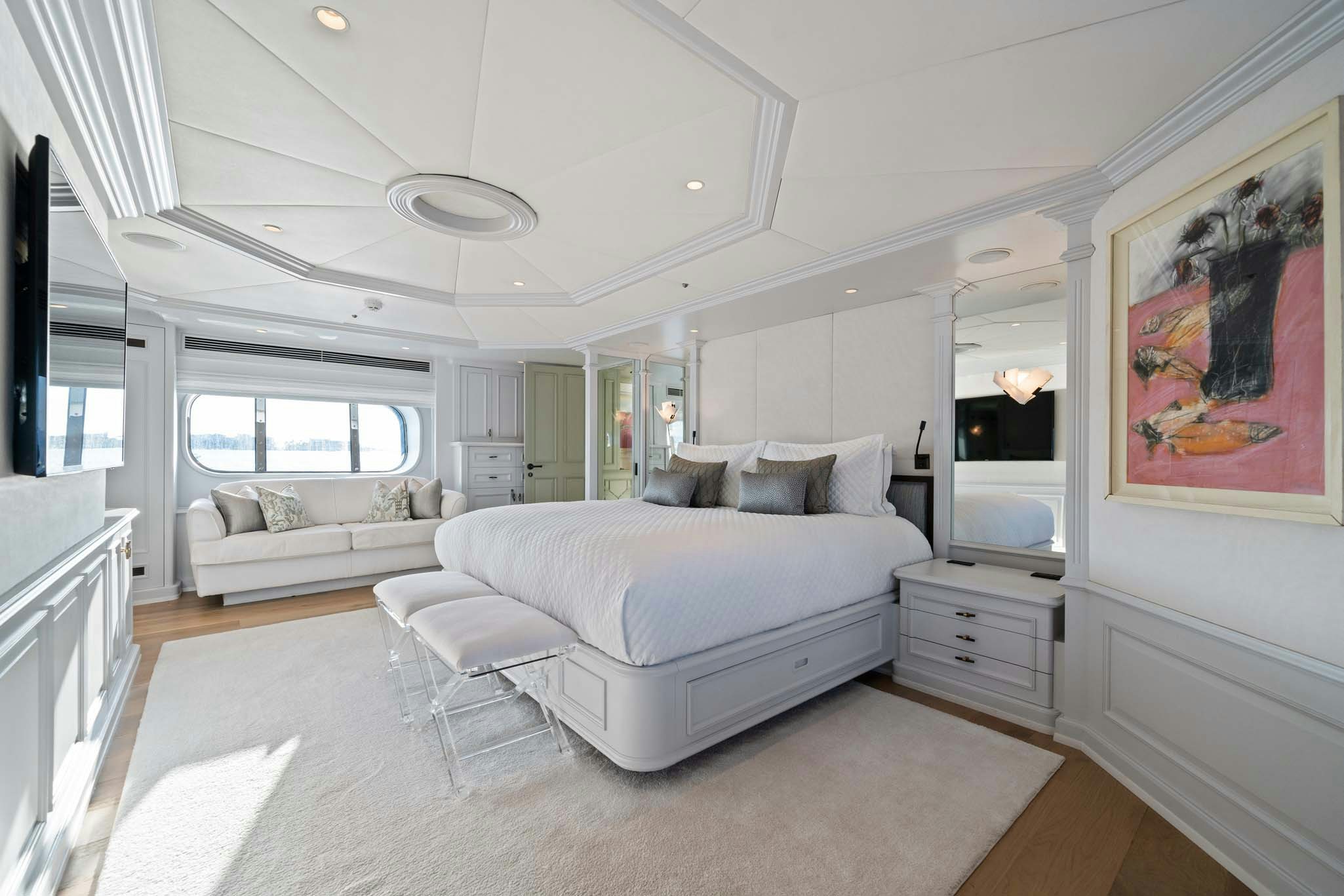 a large white living room aboard MOSAIQUE Yacht for Charter