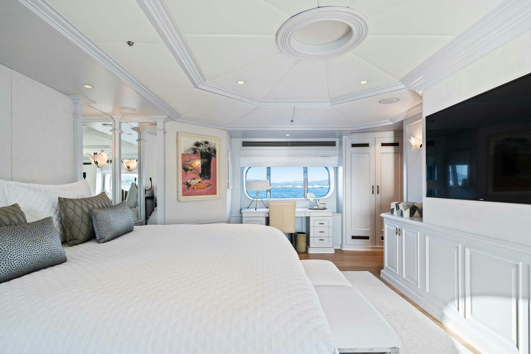 a large bedroom with a large bed aboard MOSAIQUE Yacht for Charter