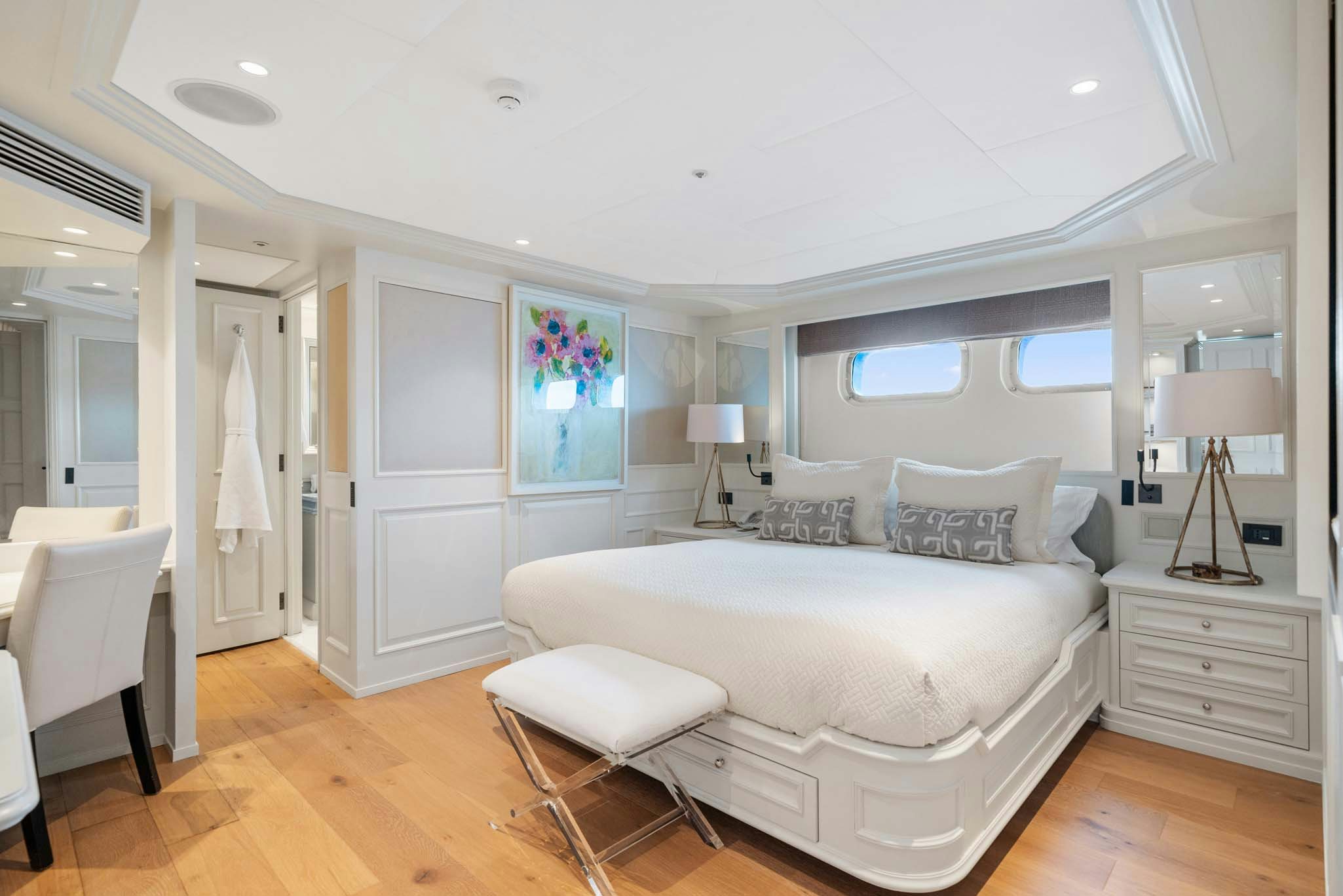 a large white bed in a room aboard MOSAIQUE Yacht for Charter