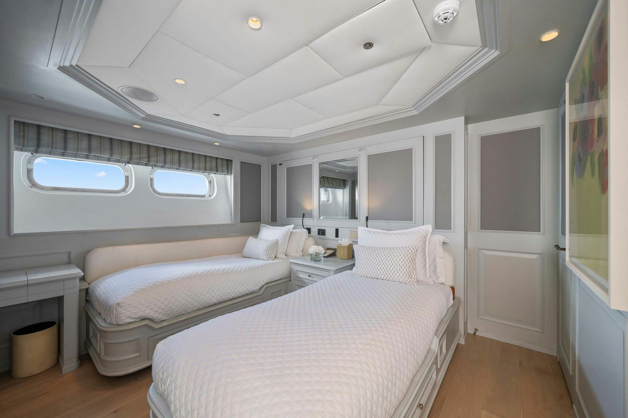 a room with two beds aboard MOSAIQUE Yacht for Charter