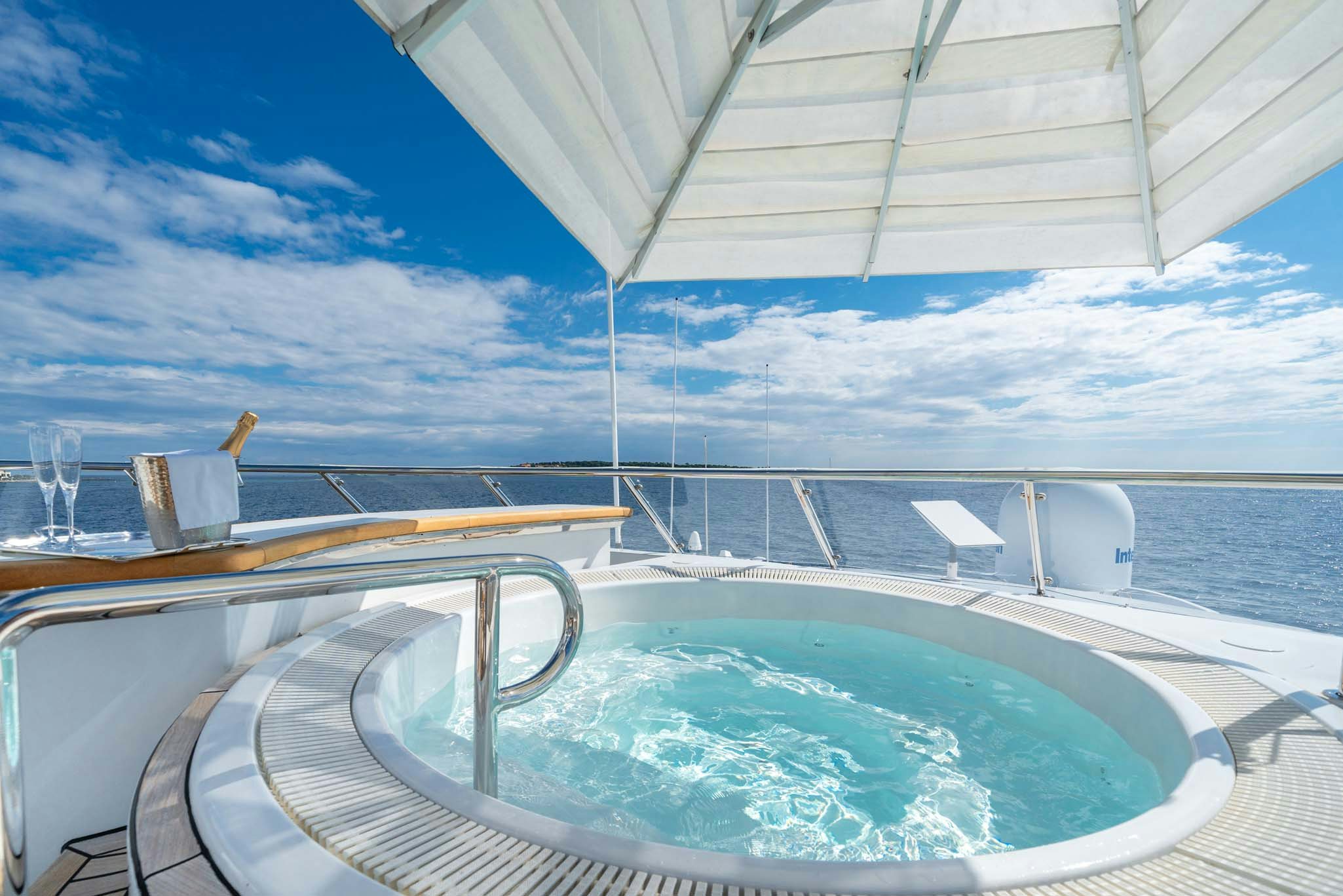 a large swimming pool aboard MOSAIQUE Yacht for Charter