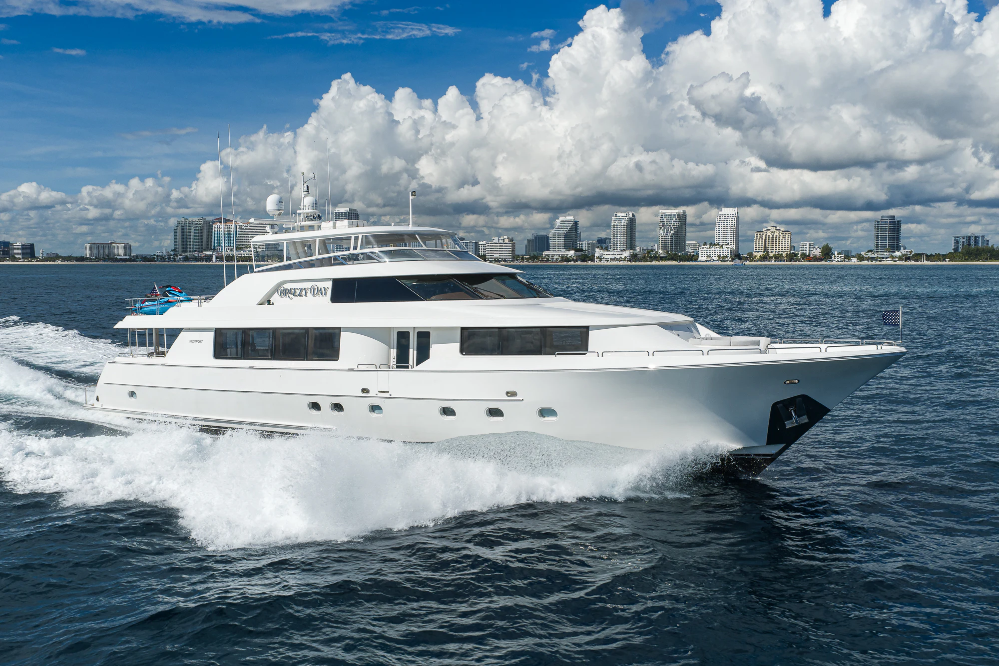 a white yacht in the water aboard BREEZY DAY Yacht for Sale