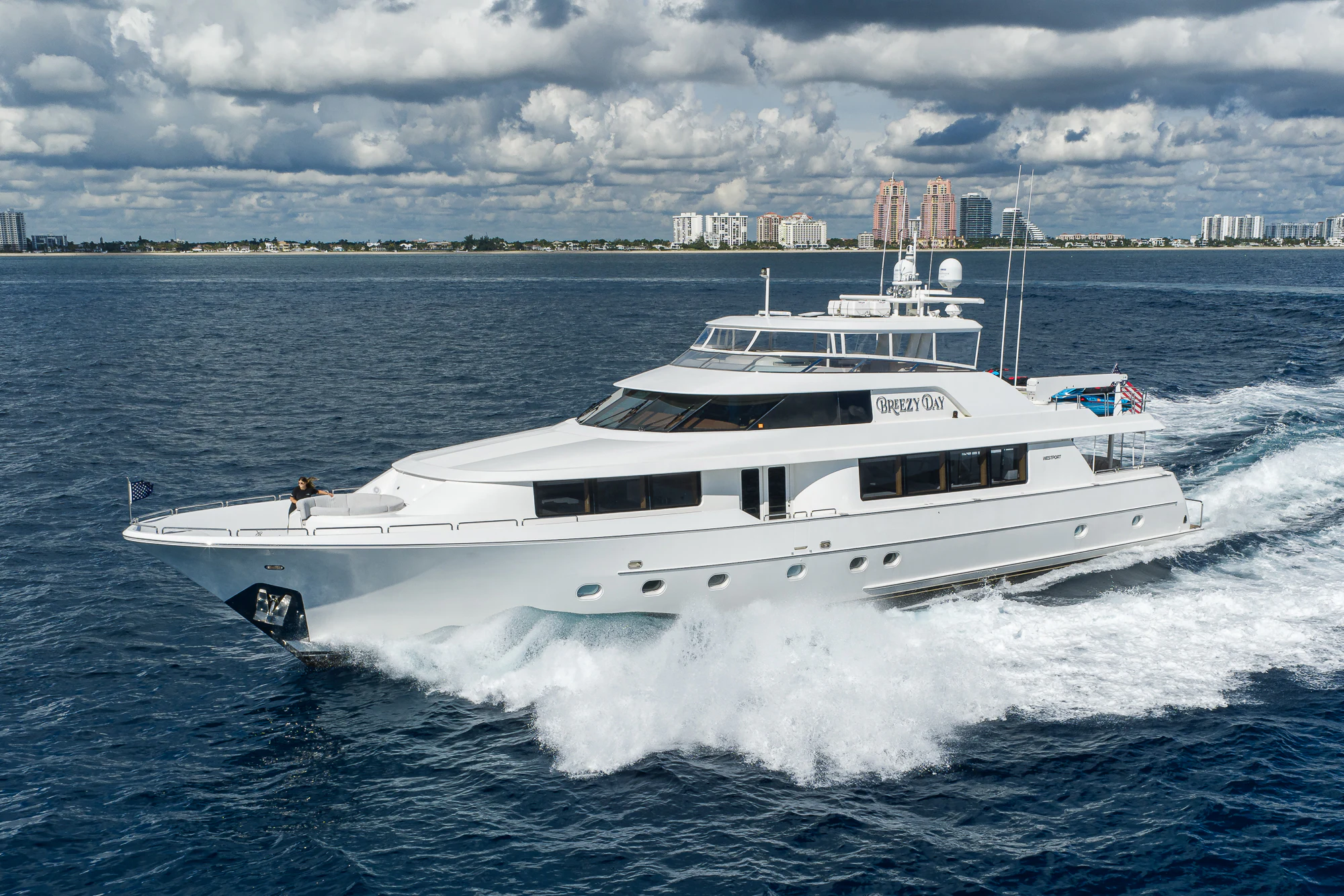 a white yacht on the water aboard BREEZY DAY Yacht for Sale