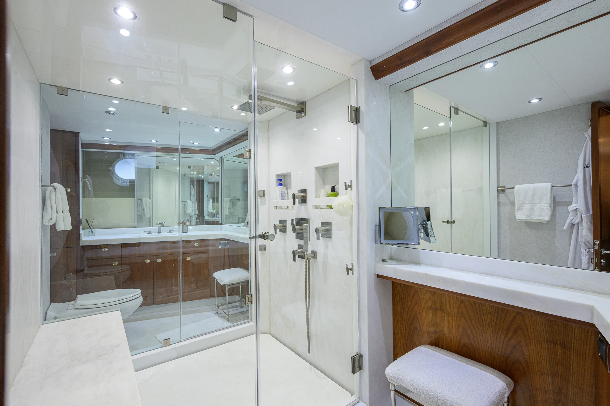 a bathroom with a large mirror aboard BREEZY DAY Yacht for Sale
