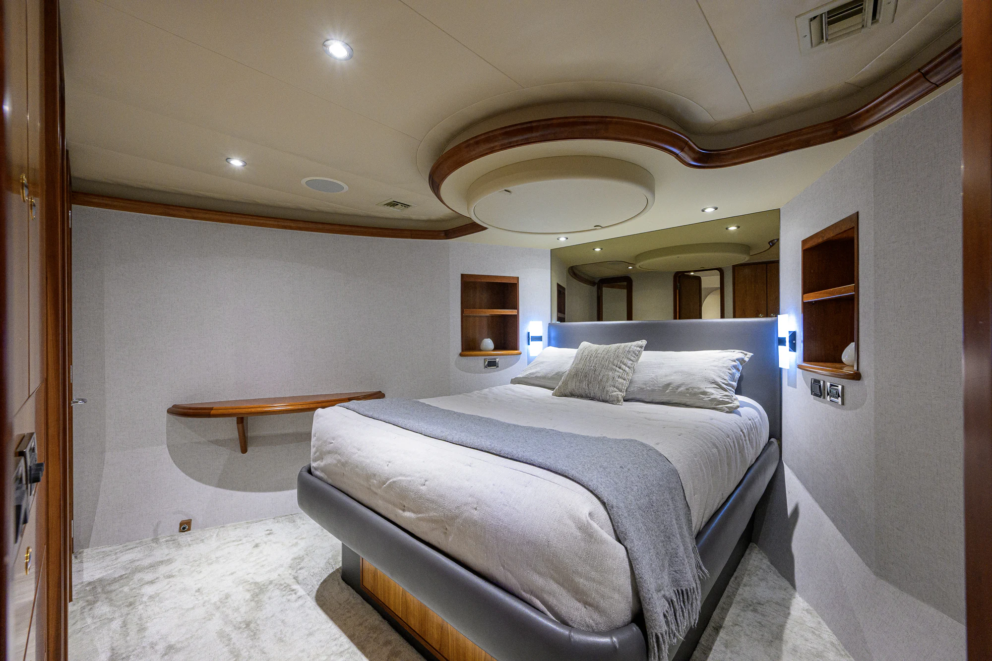 a room with a bed and a table aboard BREEZY DAY Yacht for Sale