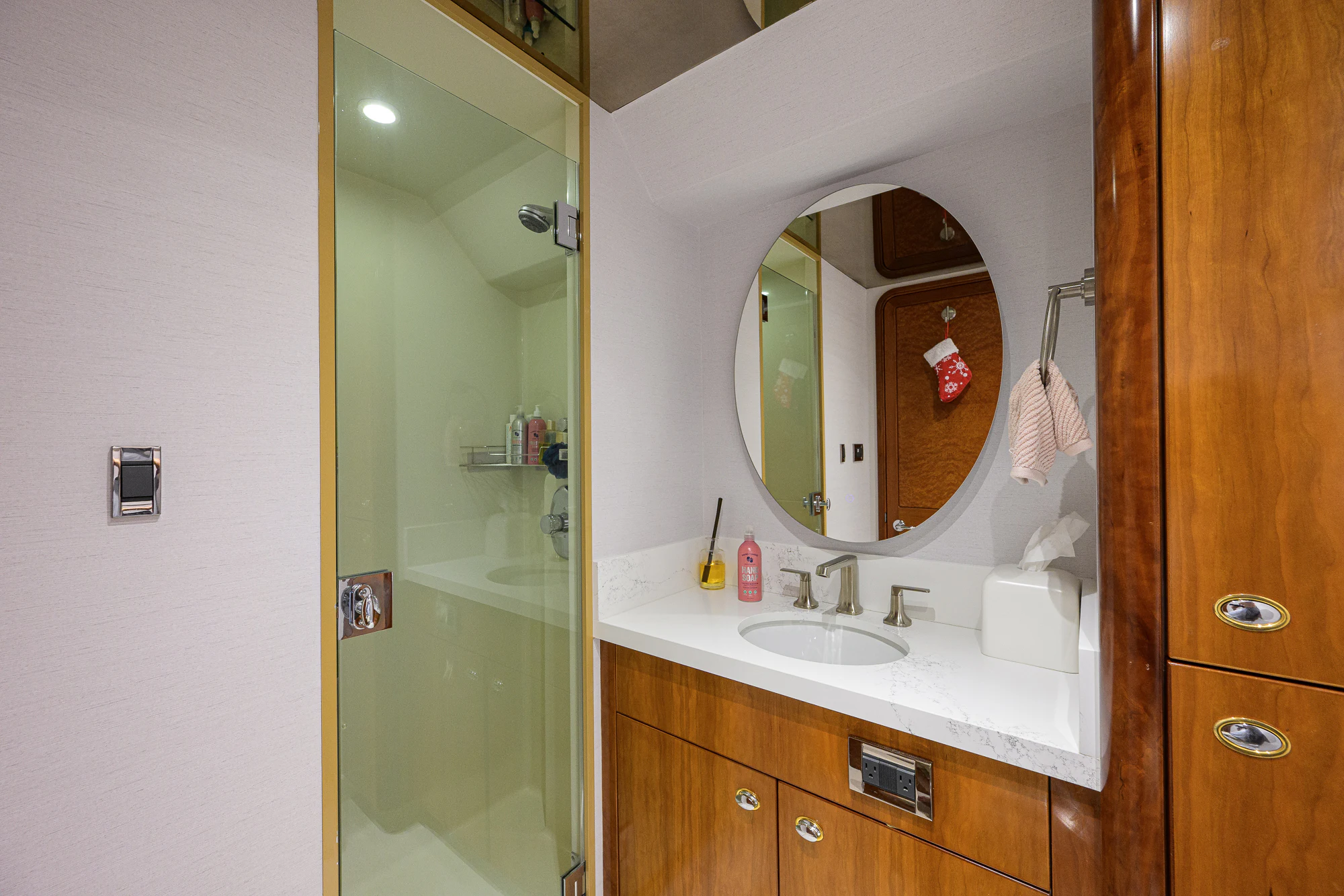 a bathroom with a large mirror aboard BREEZY DAY Yacht for Sale