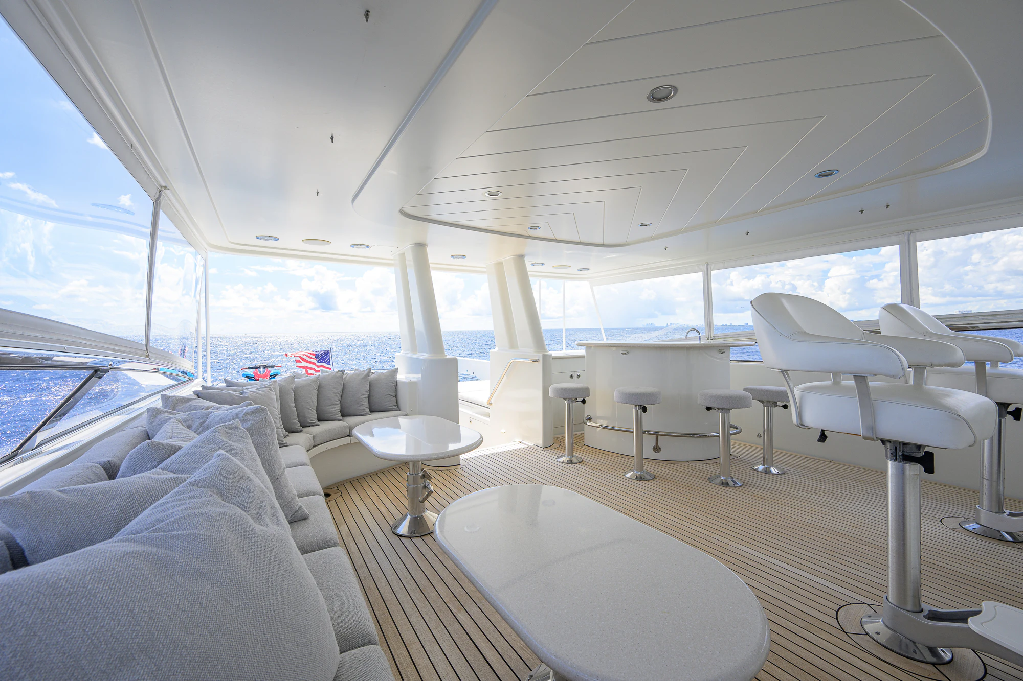 a boat with a table and chairs aboard BREEZY DAY Yacht for Sale