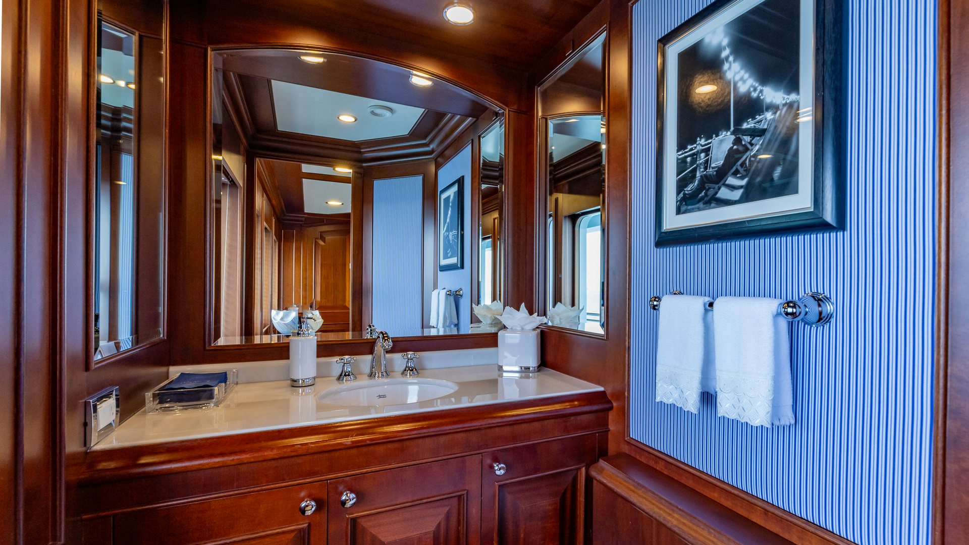 a bathroom with a sink and a mirror aboard FOCUS Yacht for Sale