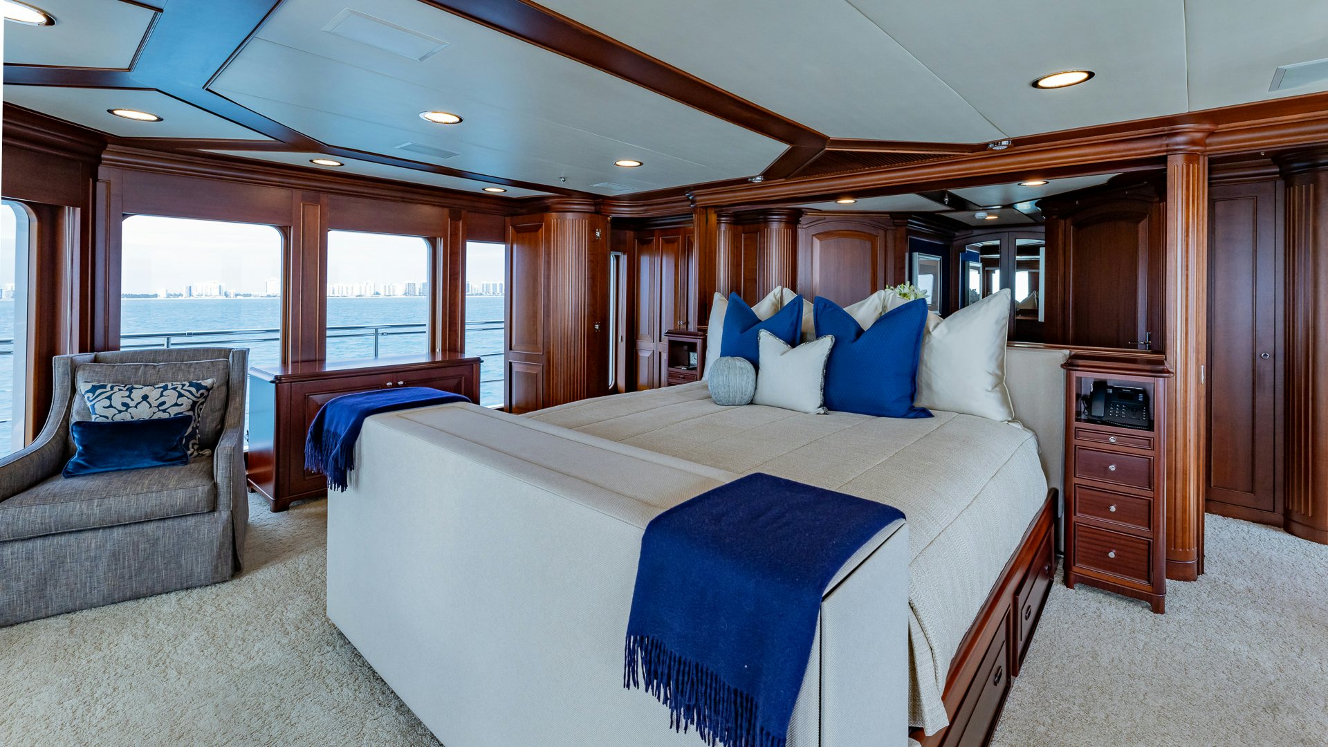 a large bedroom with a large bed aboard FOCUS Yacht for Sale