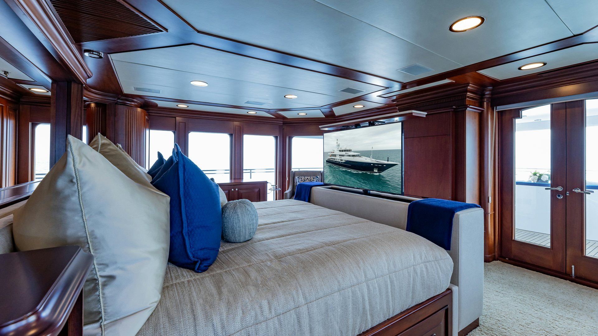 a large bed in a room aboard FOCUS Yacht for Sale