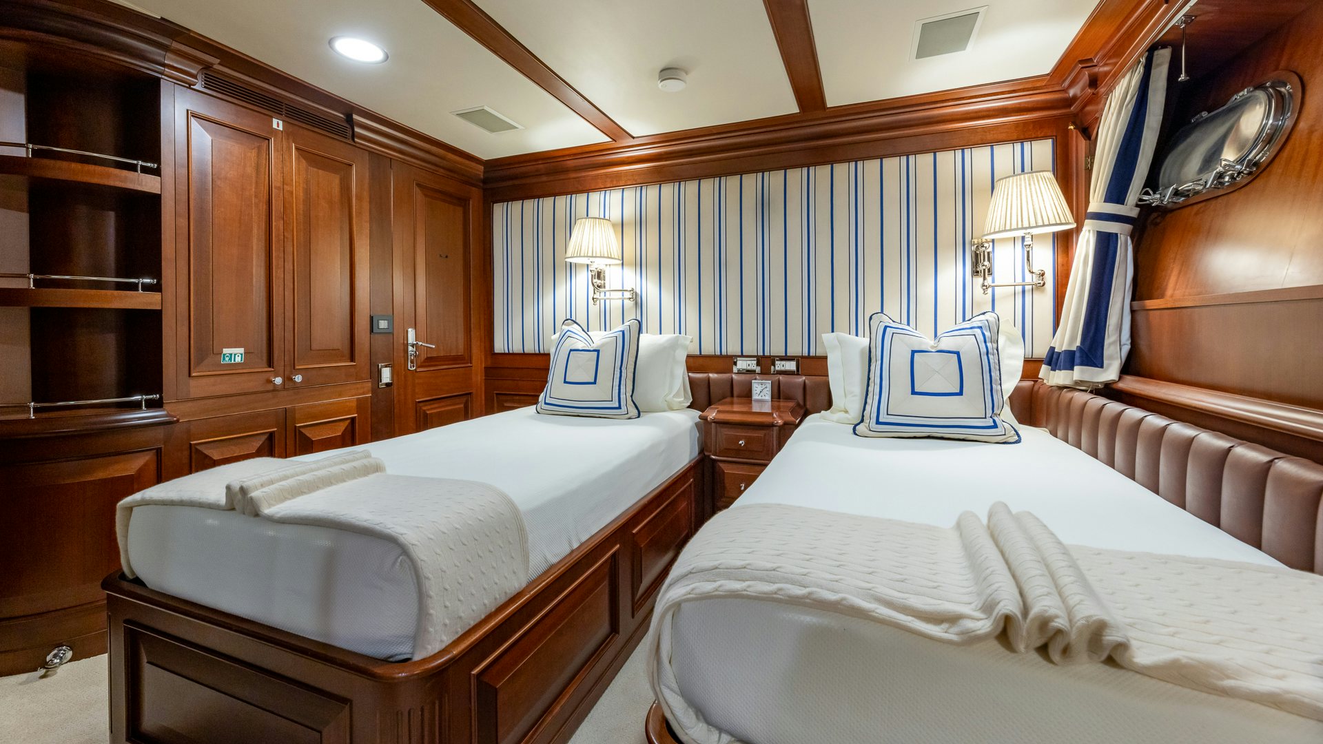 a couple of beds in a hotel room aboard FOCUS Yacht for Sale