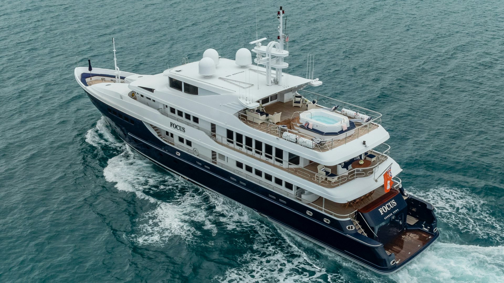 a large ship in the water aboard FOCUS Yacht for Sale