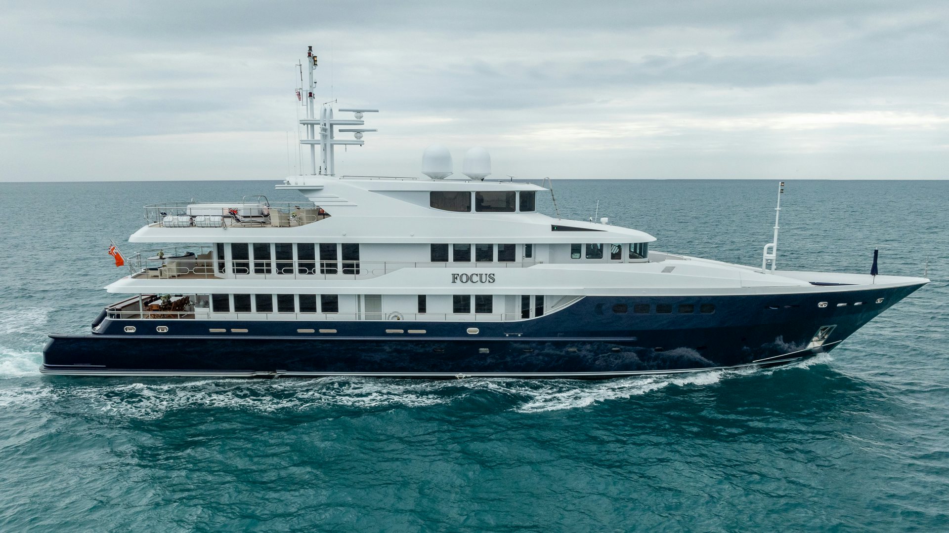 a large boat in the water aboard FOCUS Yacht for Sale