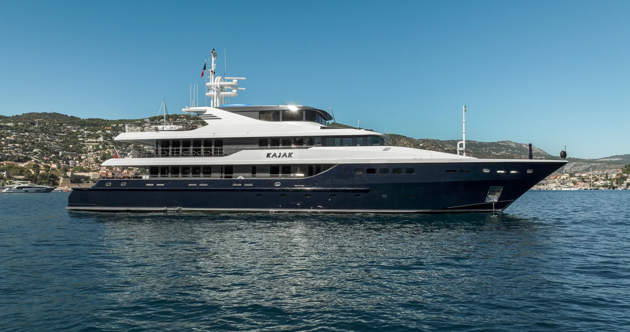 a large ship in the water aboard KAJAK Yacht for Sale