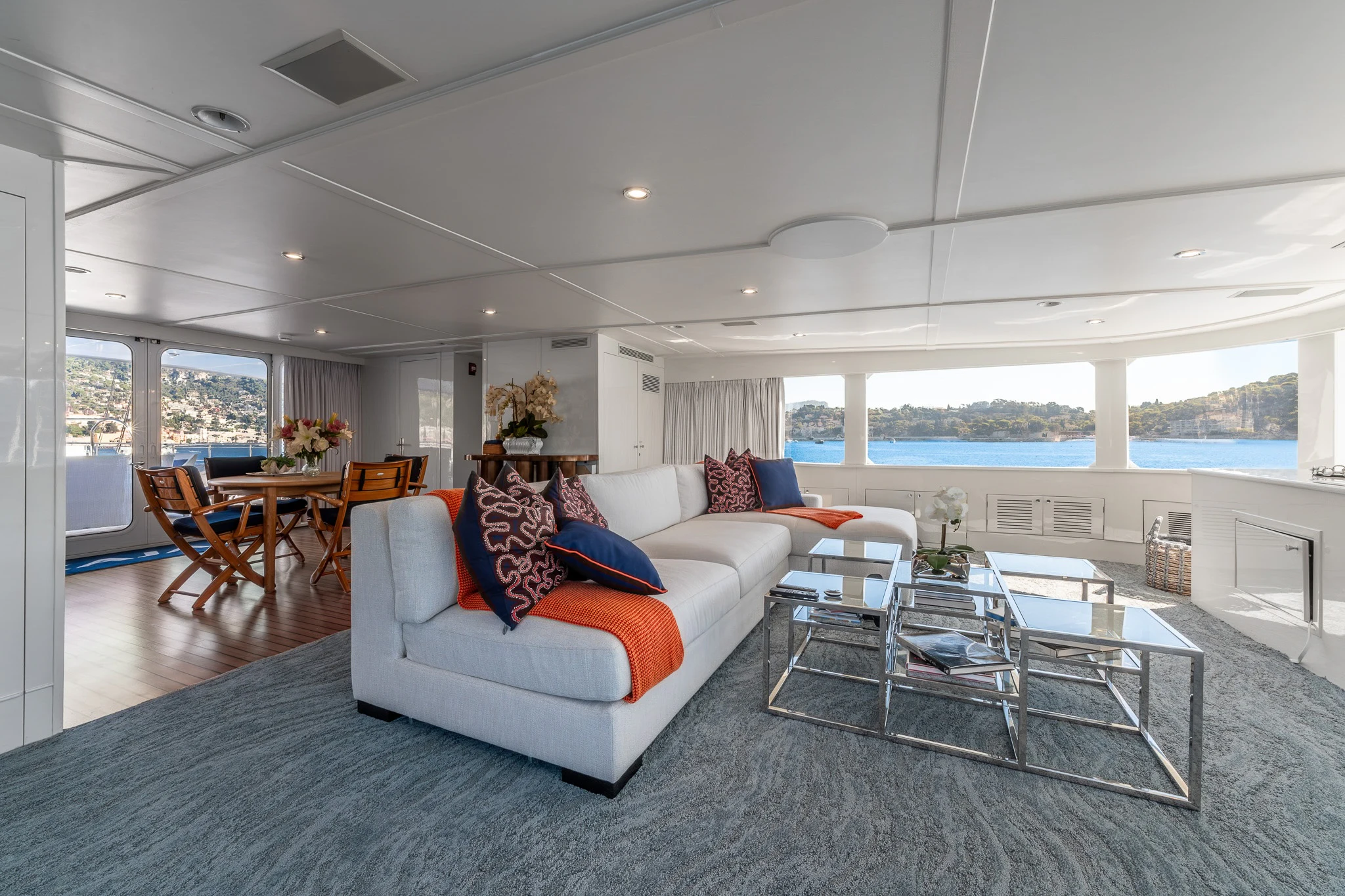 a living room with a large window aboard KAJAK Yacht for Sale
