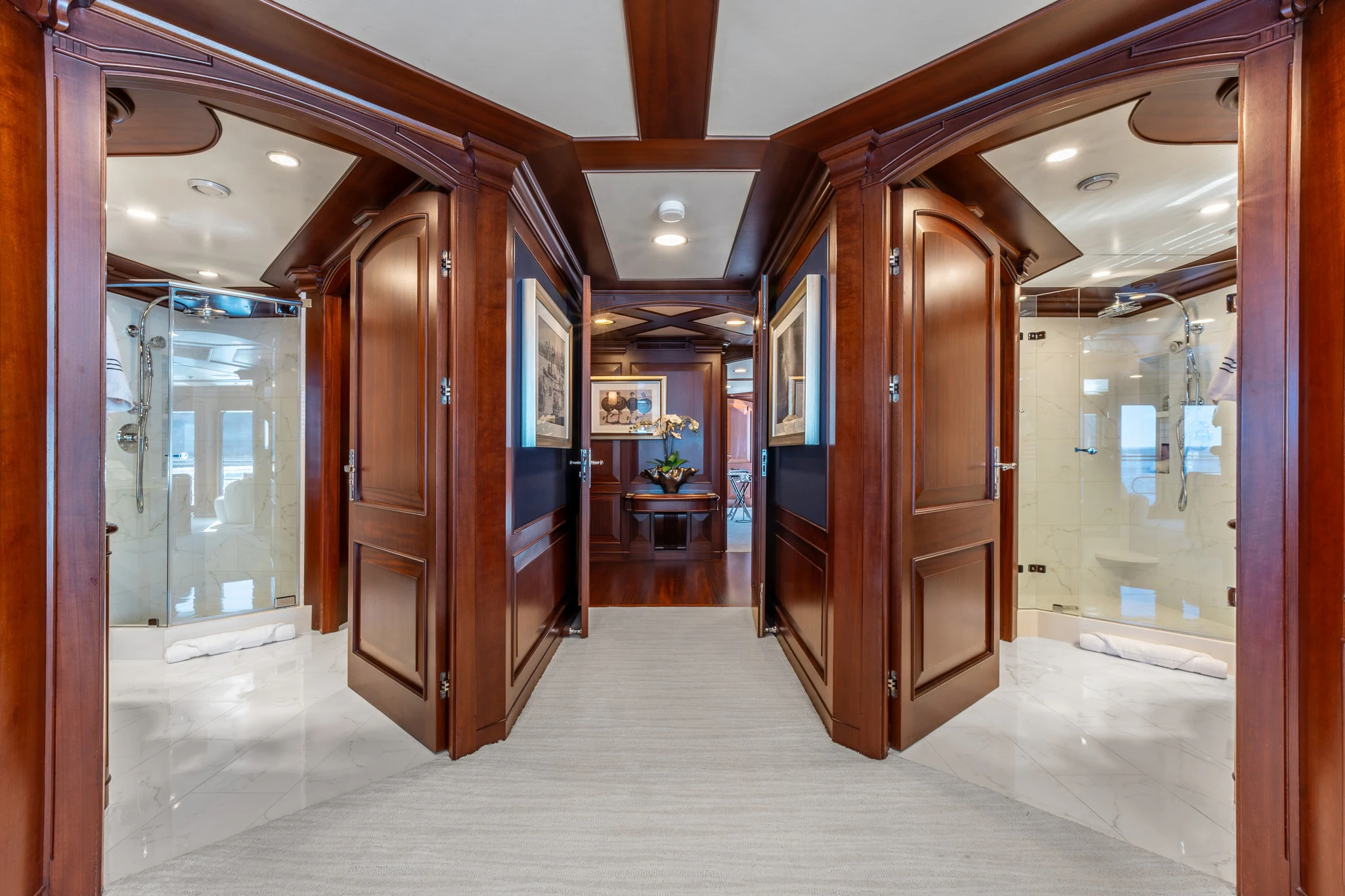 a long hallway with doors aboard KAJAK Yacht for Sale