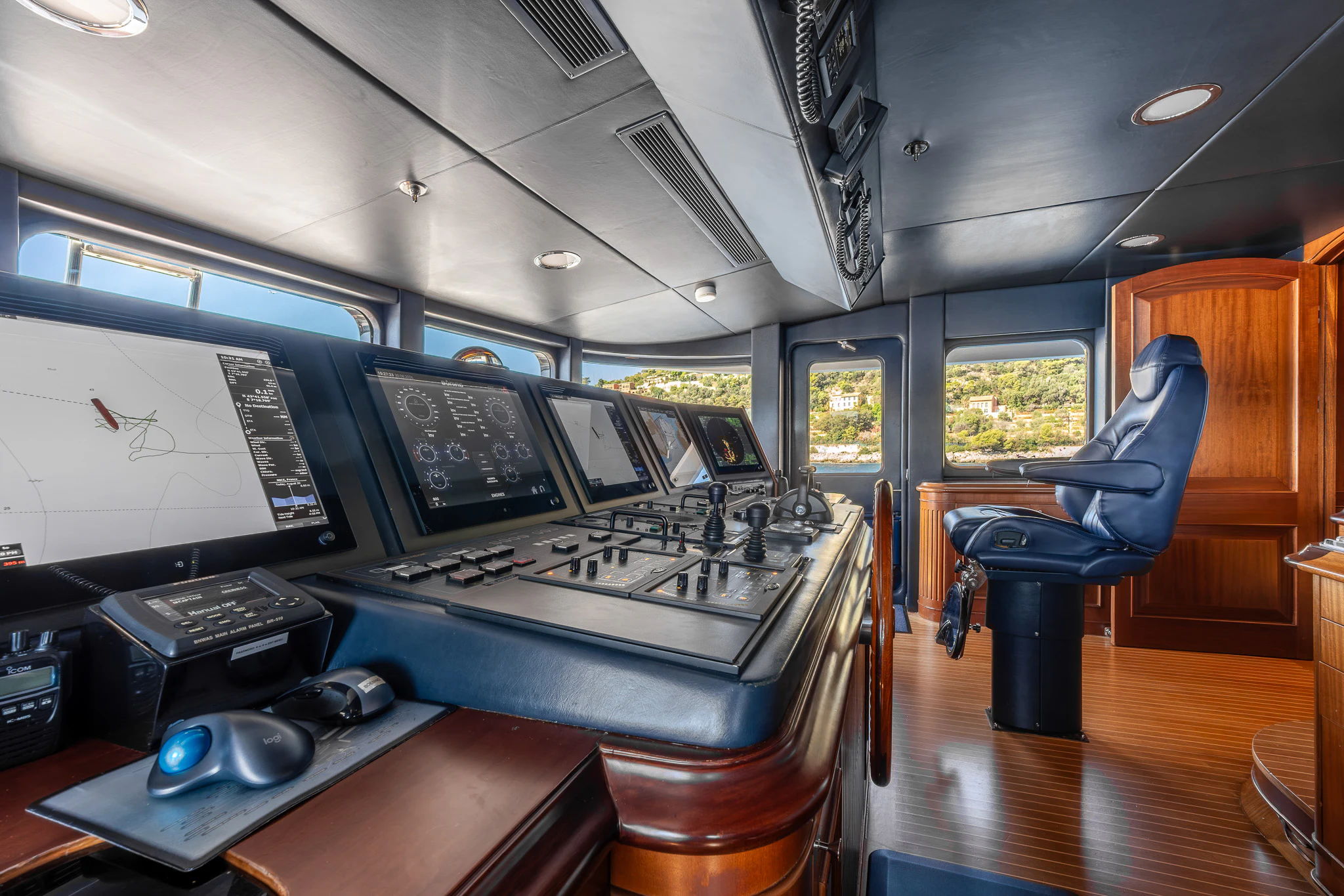 a room with computers and monitors aboard KAJAK Yacht for Sale