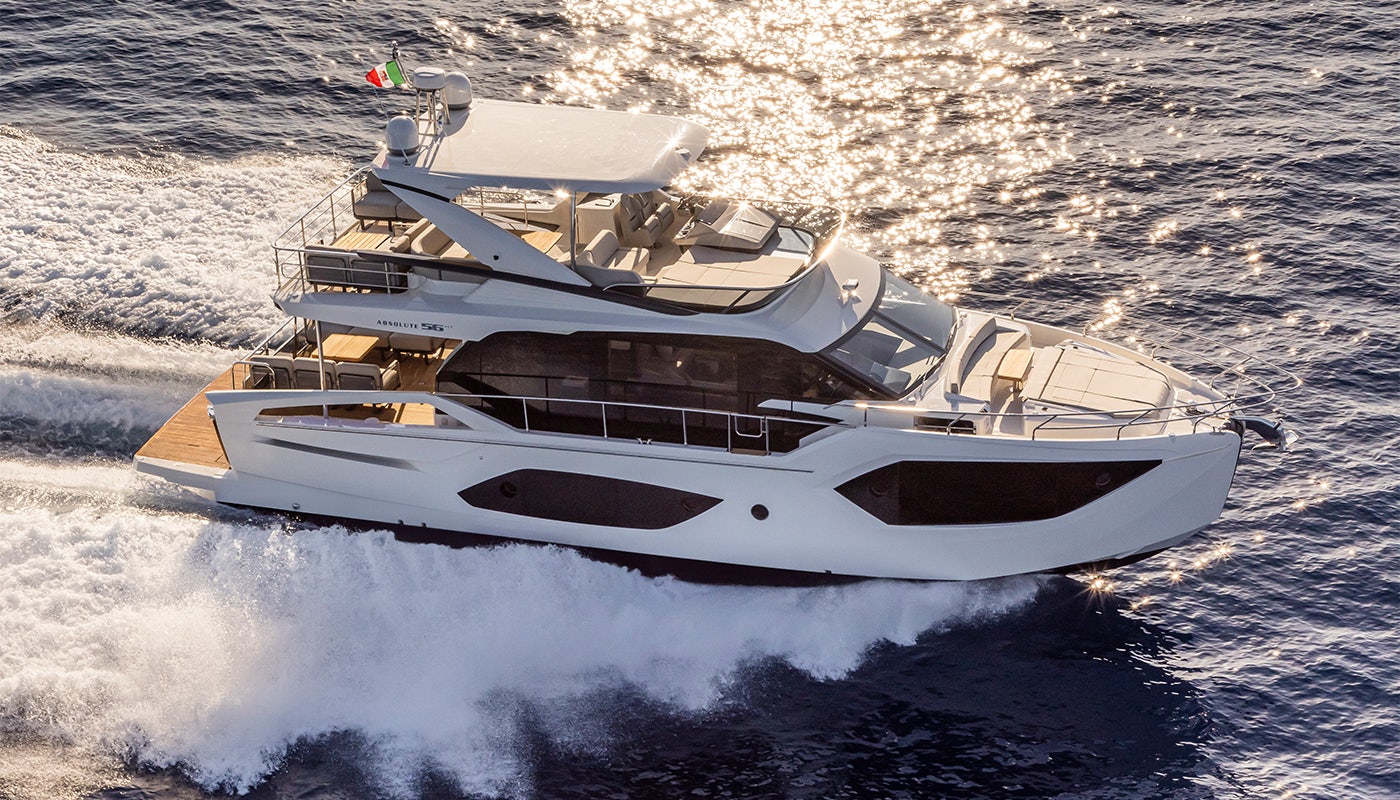 a white yacht on the water aboard ABSOLUTE 56 FLYBRIDGE Yacht for Sale
