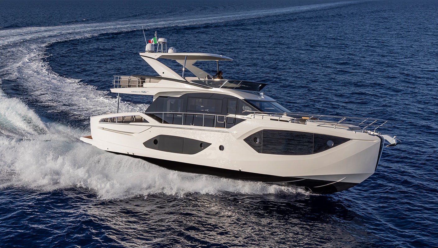 a white yacht on the water aboard ABSOLUTE 56 FLYBRIDGE Yacht for Sale