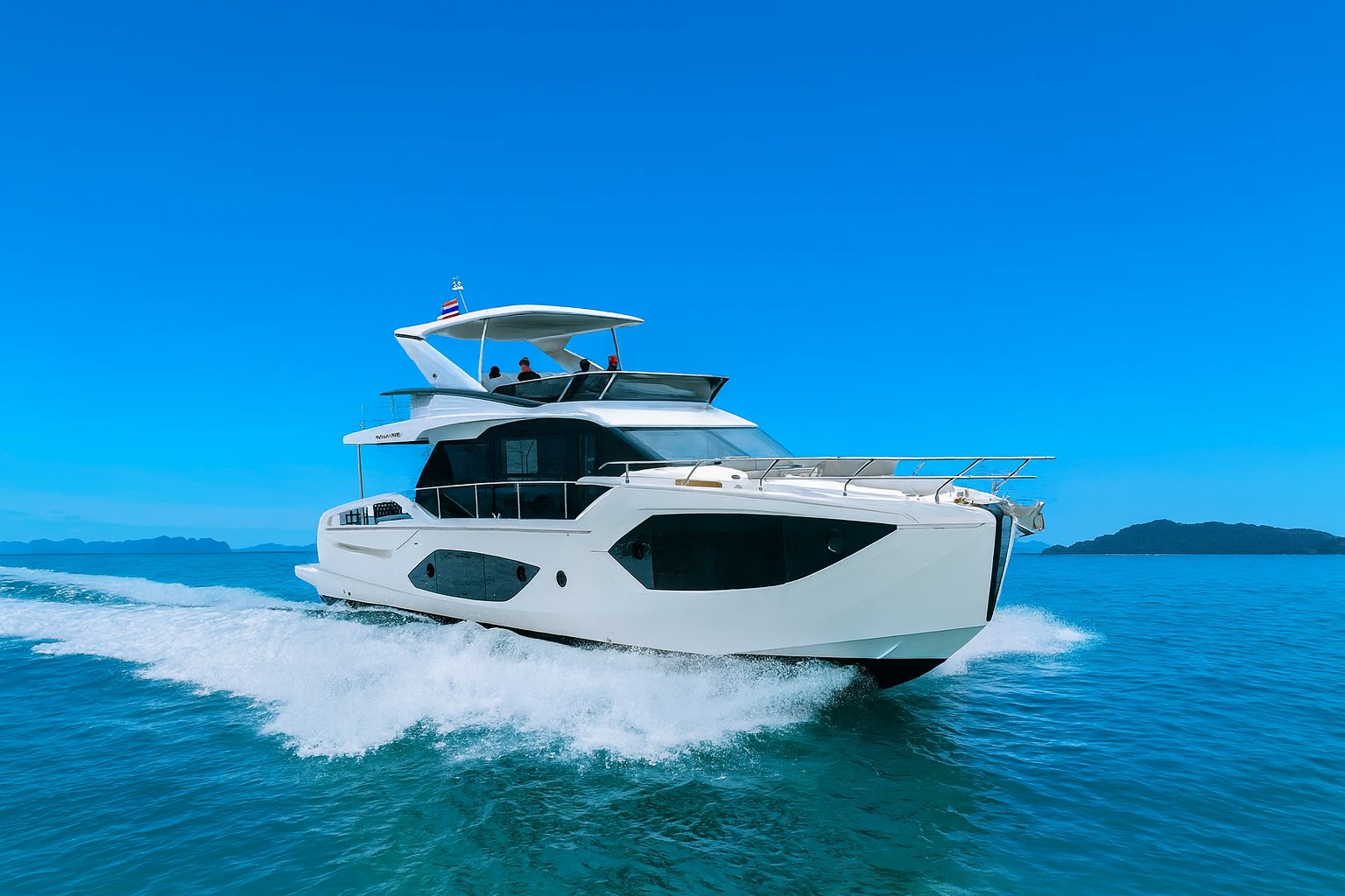 a boat on the water aboard ABSOLUTE 56 FLYBRIDGE Yacht for Sale