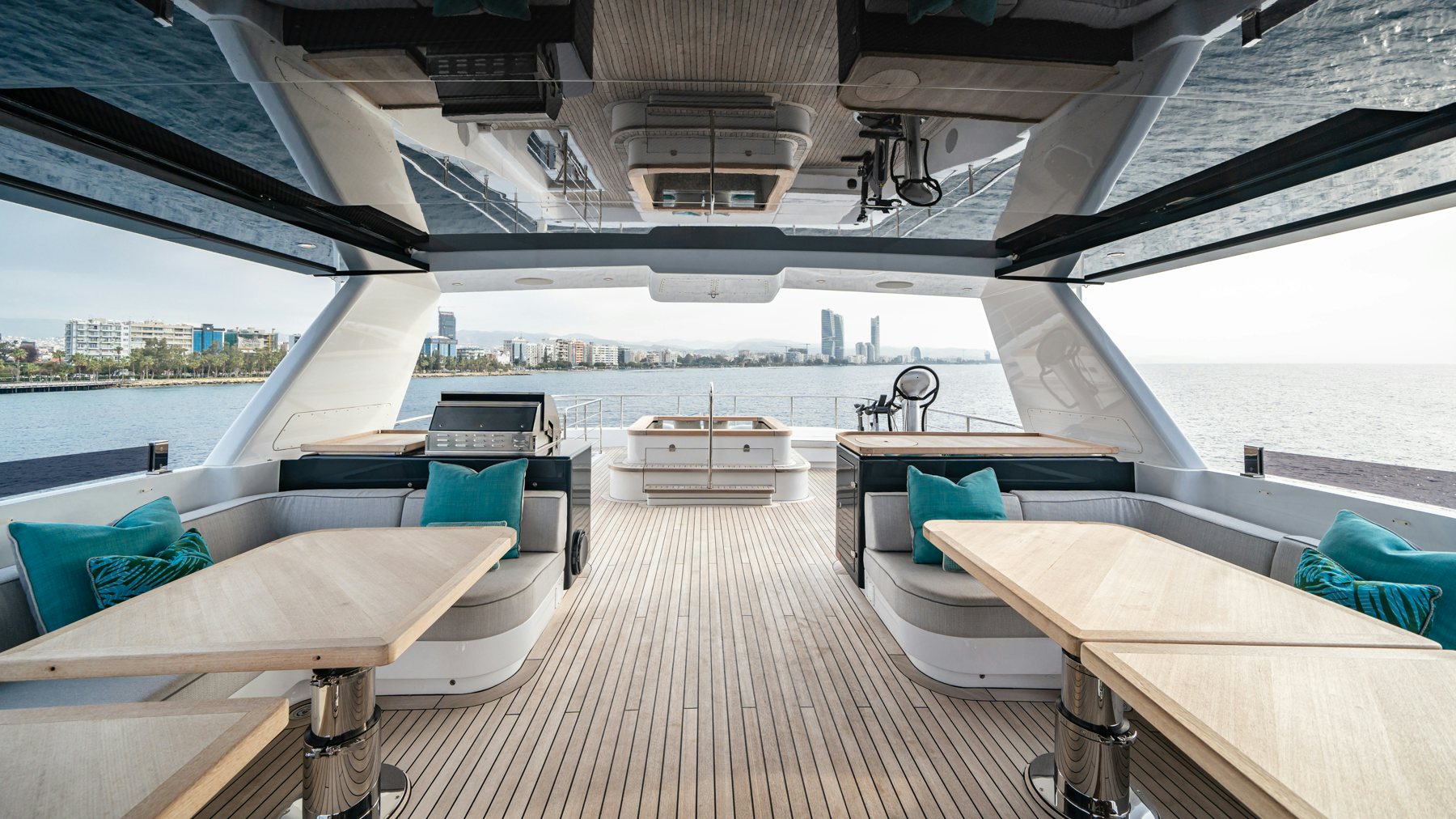 a deck with a deck and chairs aboard CAPE COD II Yacht for Sale