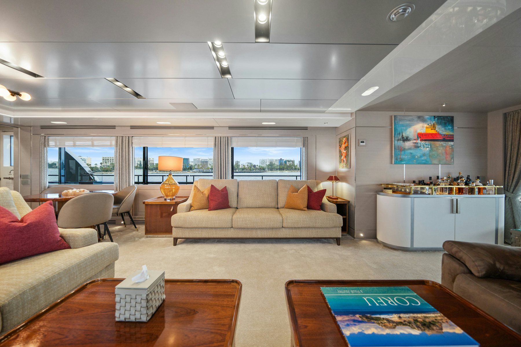 a living room with a large window aboard CAPE COD II Yacht for Sale