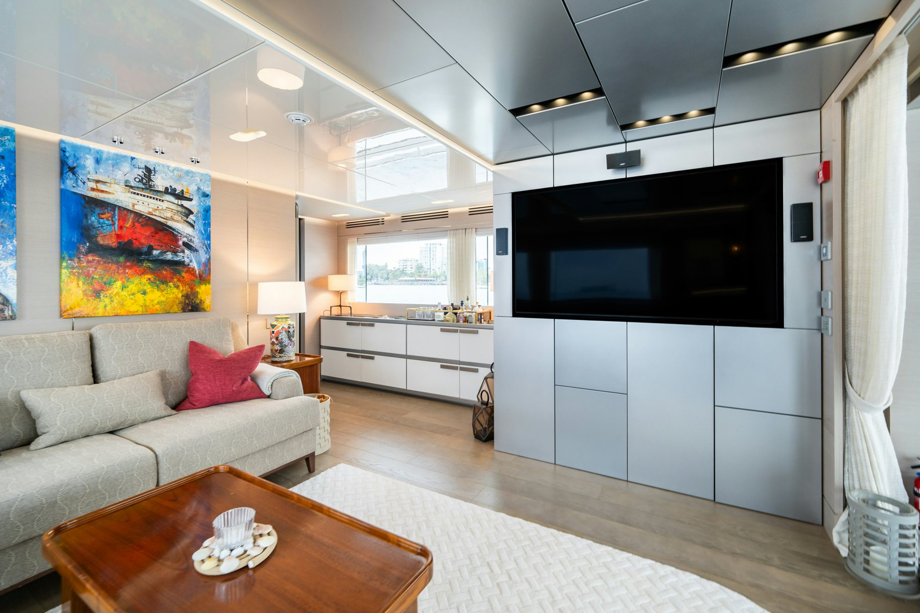 a living room with a large tv aboard CAPE COD II Yacht for Sale