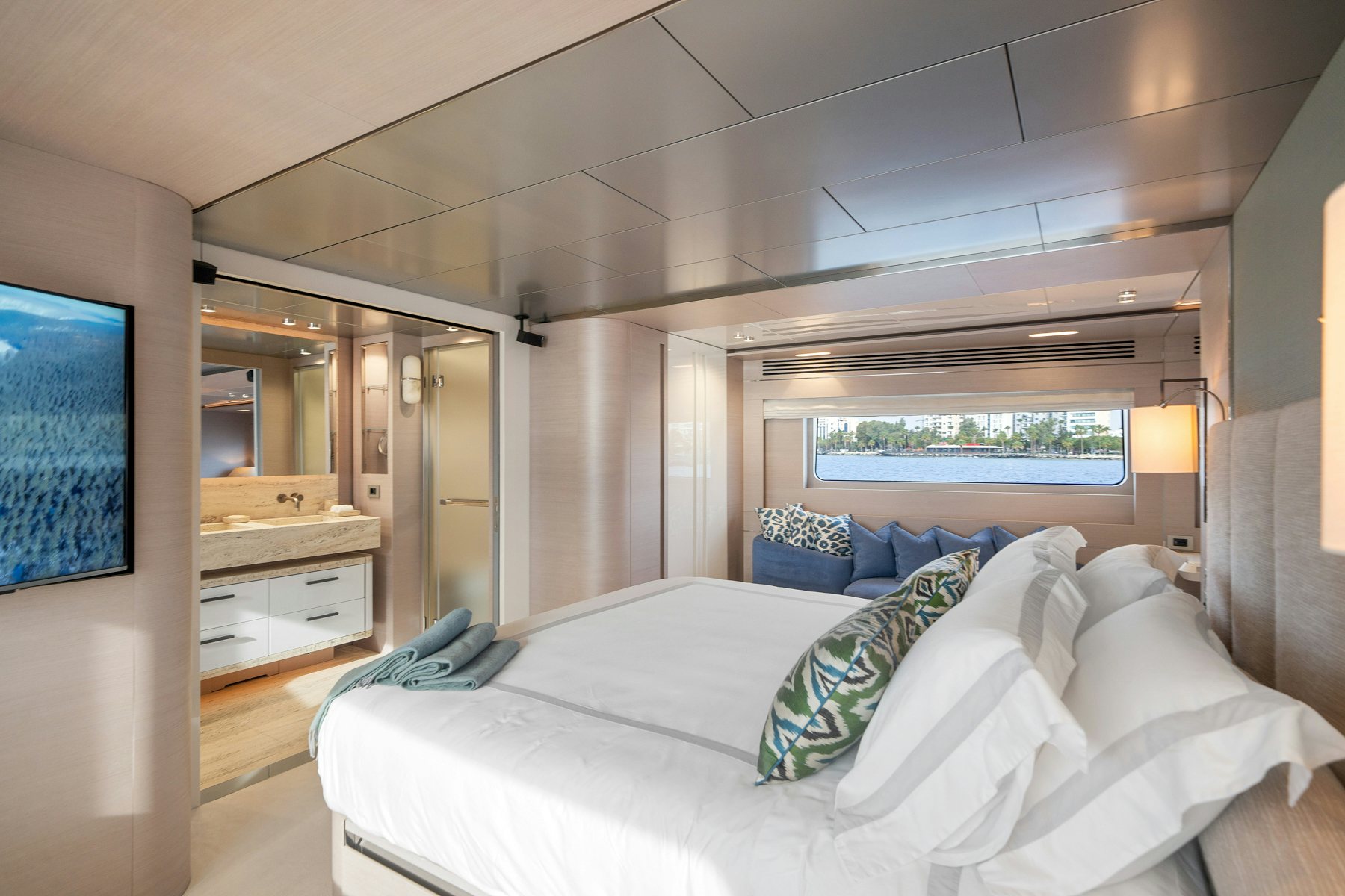 a bedroom with a large bed aboard CAPE COD II Yacht for Sale