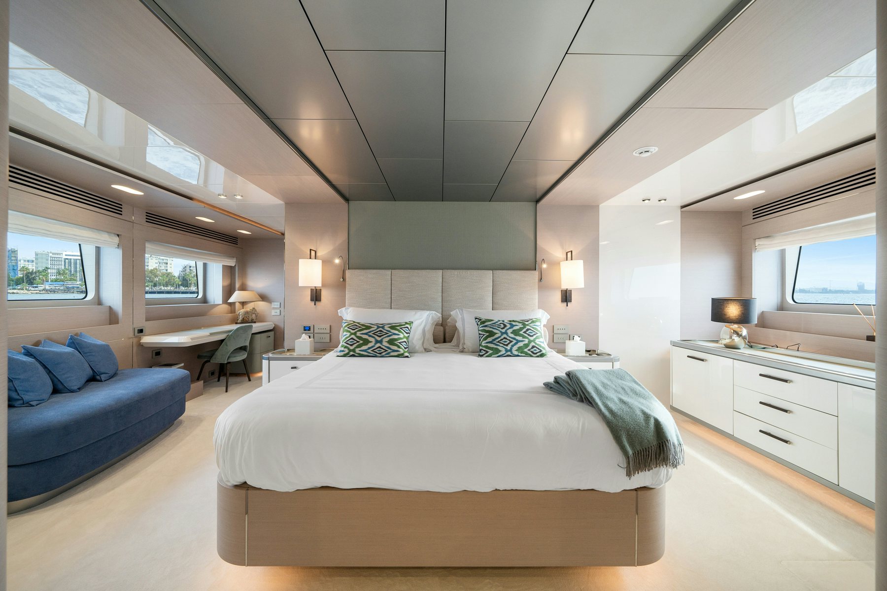 a bedroom with a bed and a couch aboard CAPE COD II Yacht for Sale
