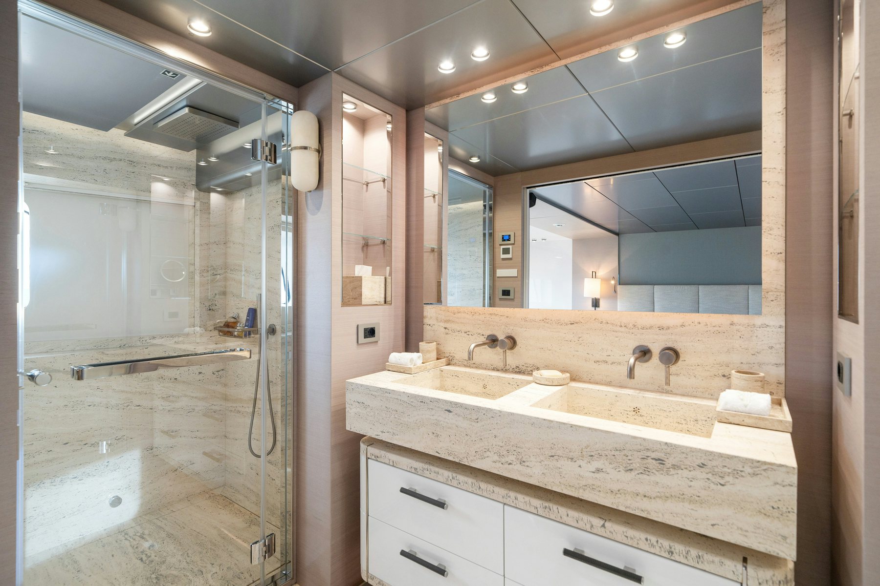 a bathroom with a large mirror aboard CAPE COD II Yacht for Sale
