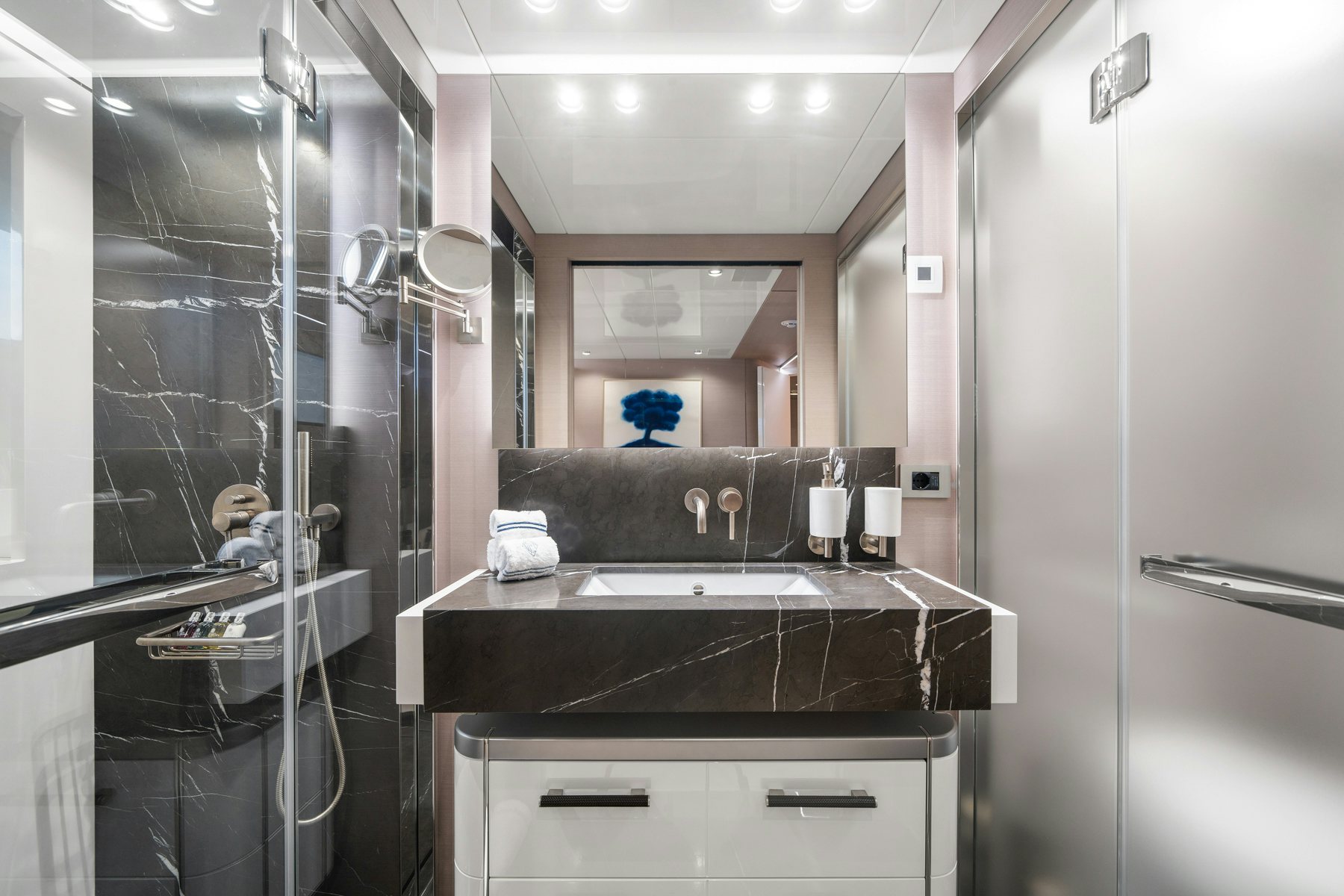 a bathroom with a sink and a mirror aboard CAPE COD II Yacht for Sale