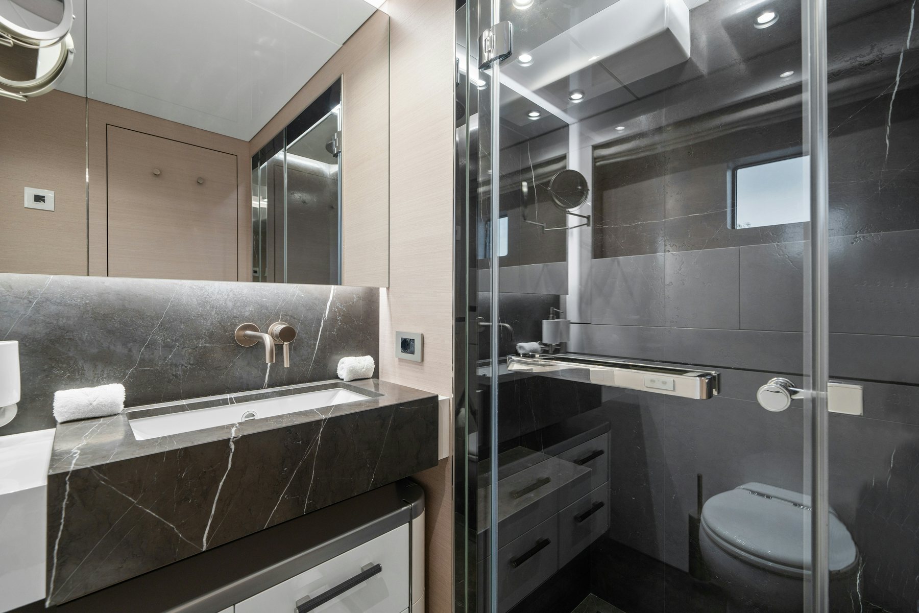 a bathroom with a glass shower aboard CAPE COD II Yacht for Sale