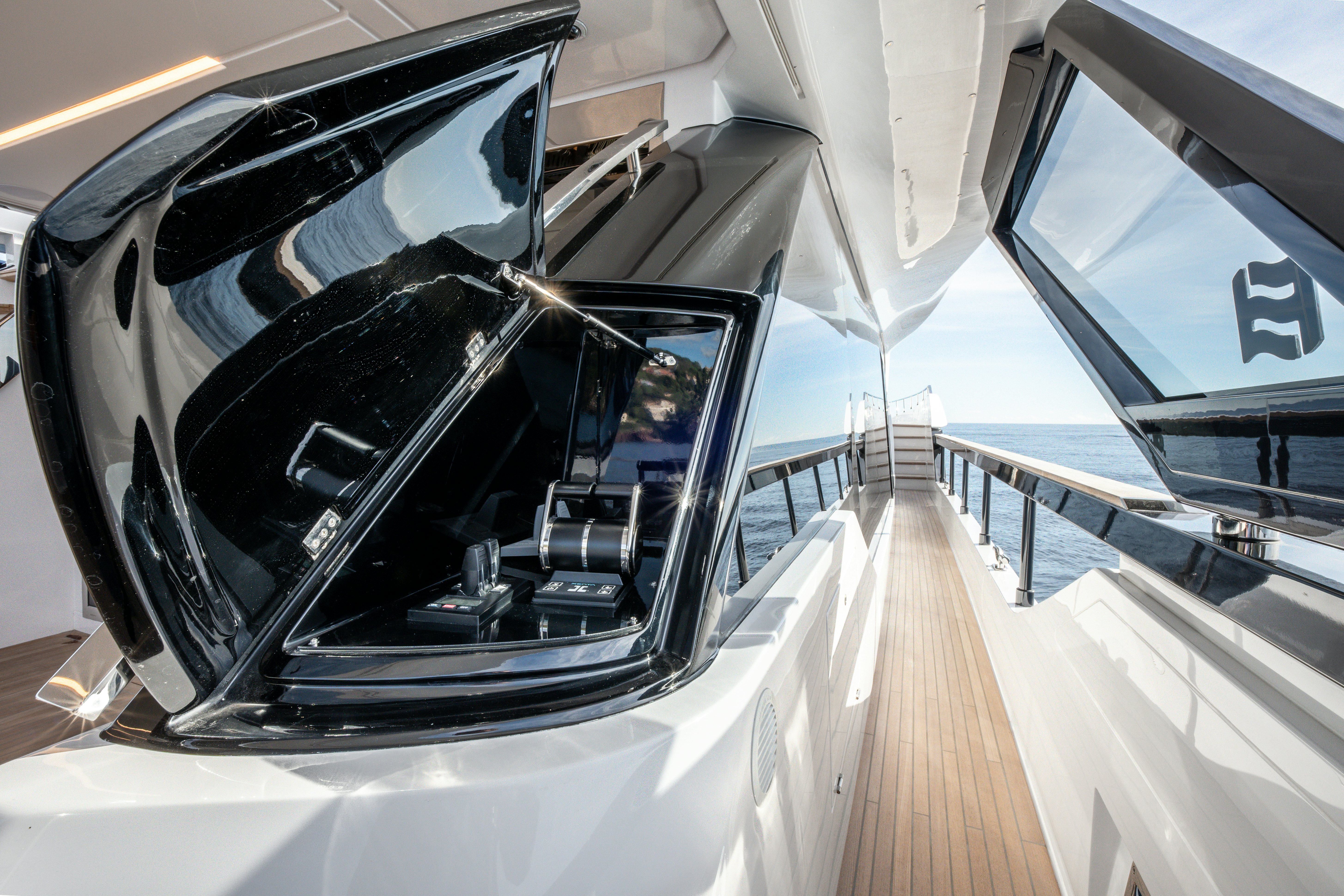 a car with a mirror on the side aboard TOGETHER Yacht for Sale
