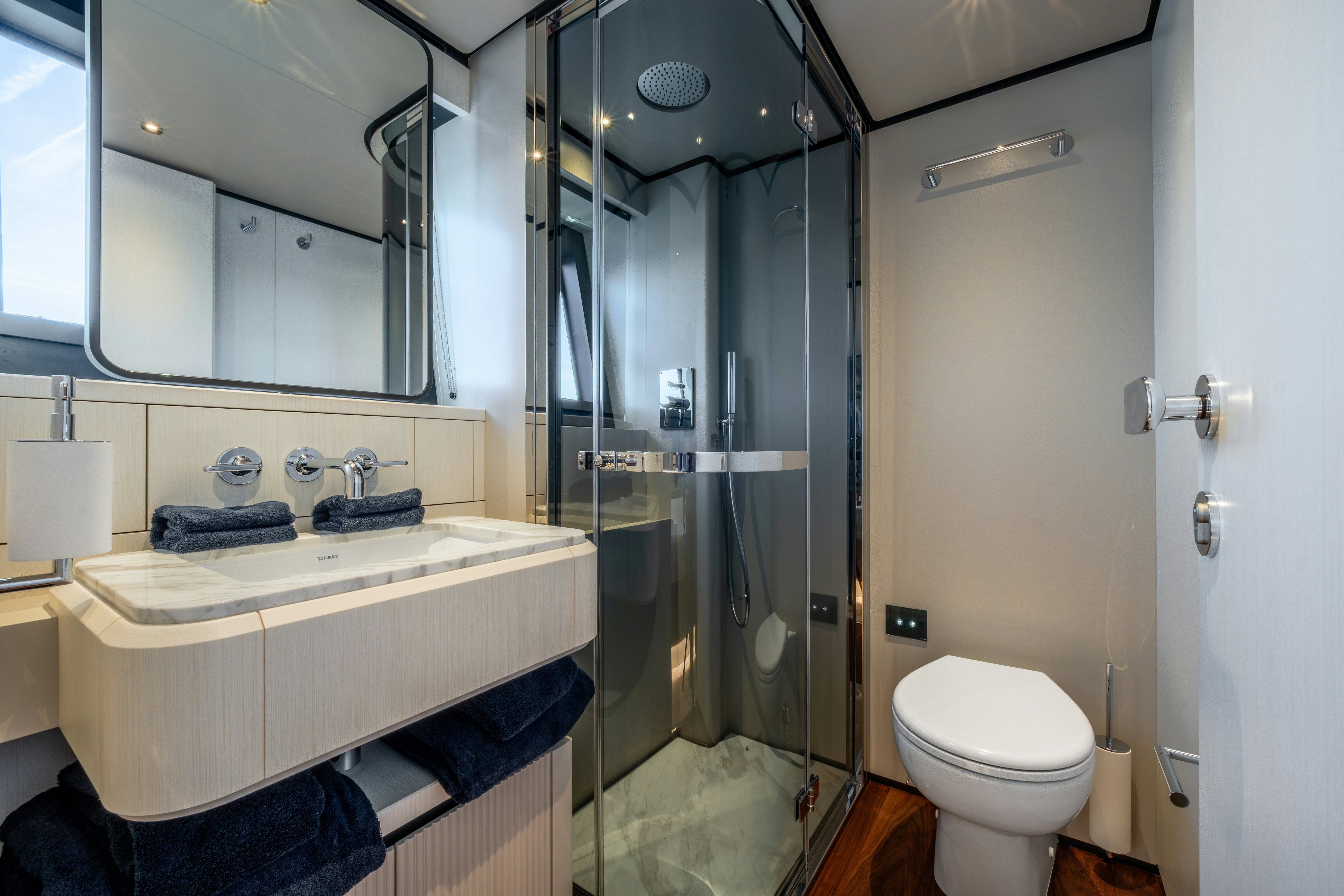a bathroom with a glass shower aboard TOGETHER Yacht for Sale