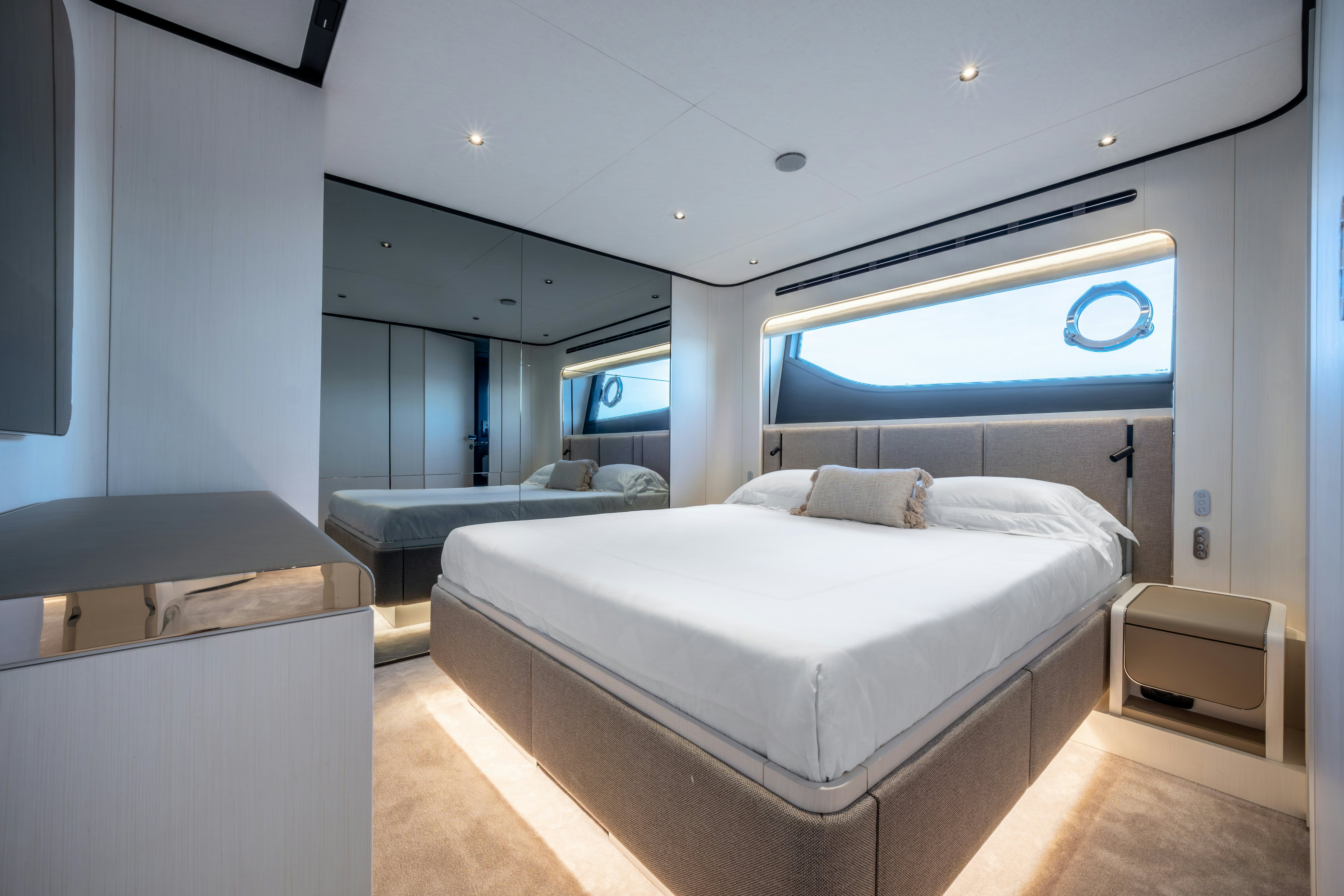a room with a bed and a desk aboard TOGETHER Yacht for Sale