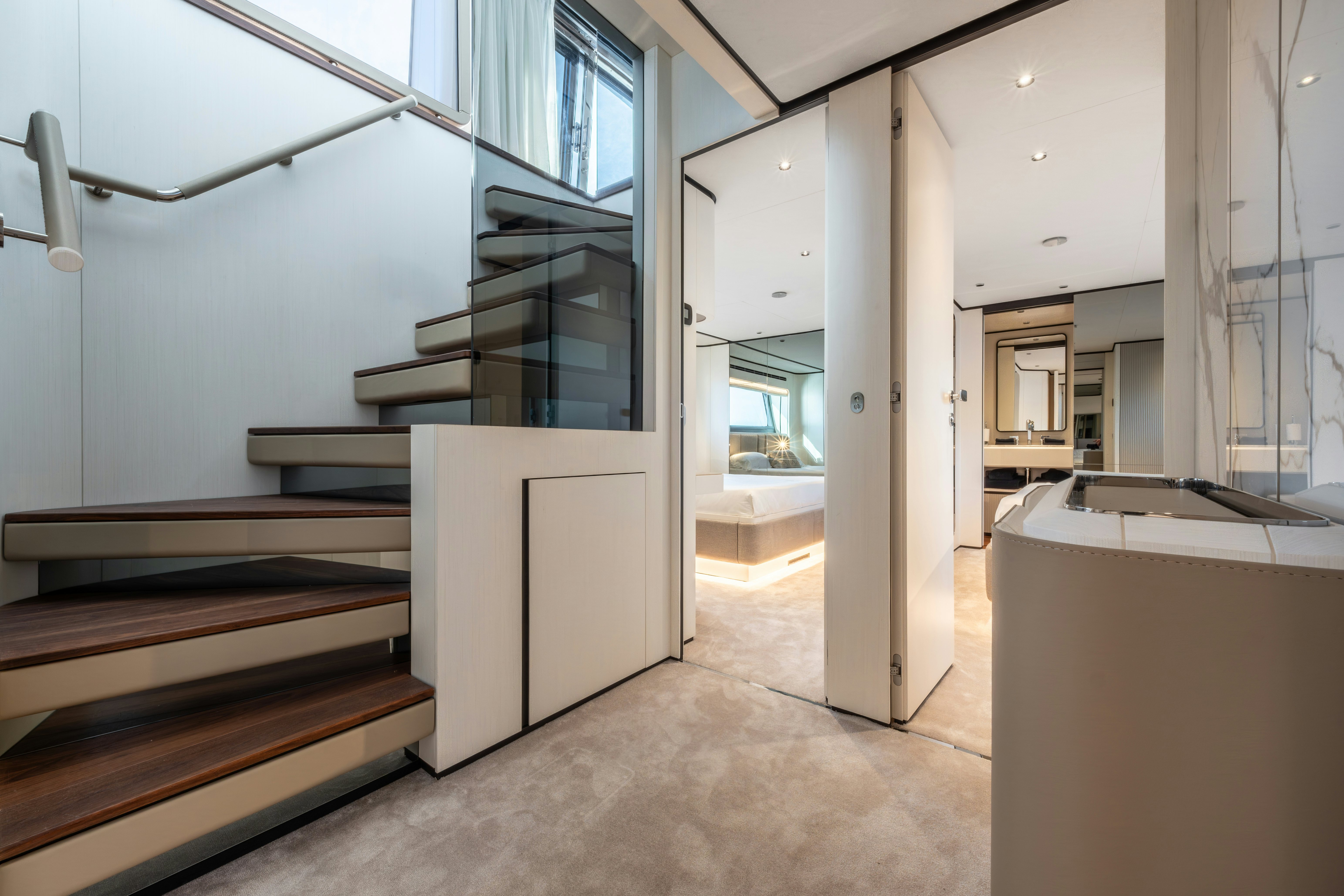 a room with a door and a staircase aboard TOGETHER Yacht for Sale