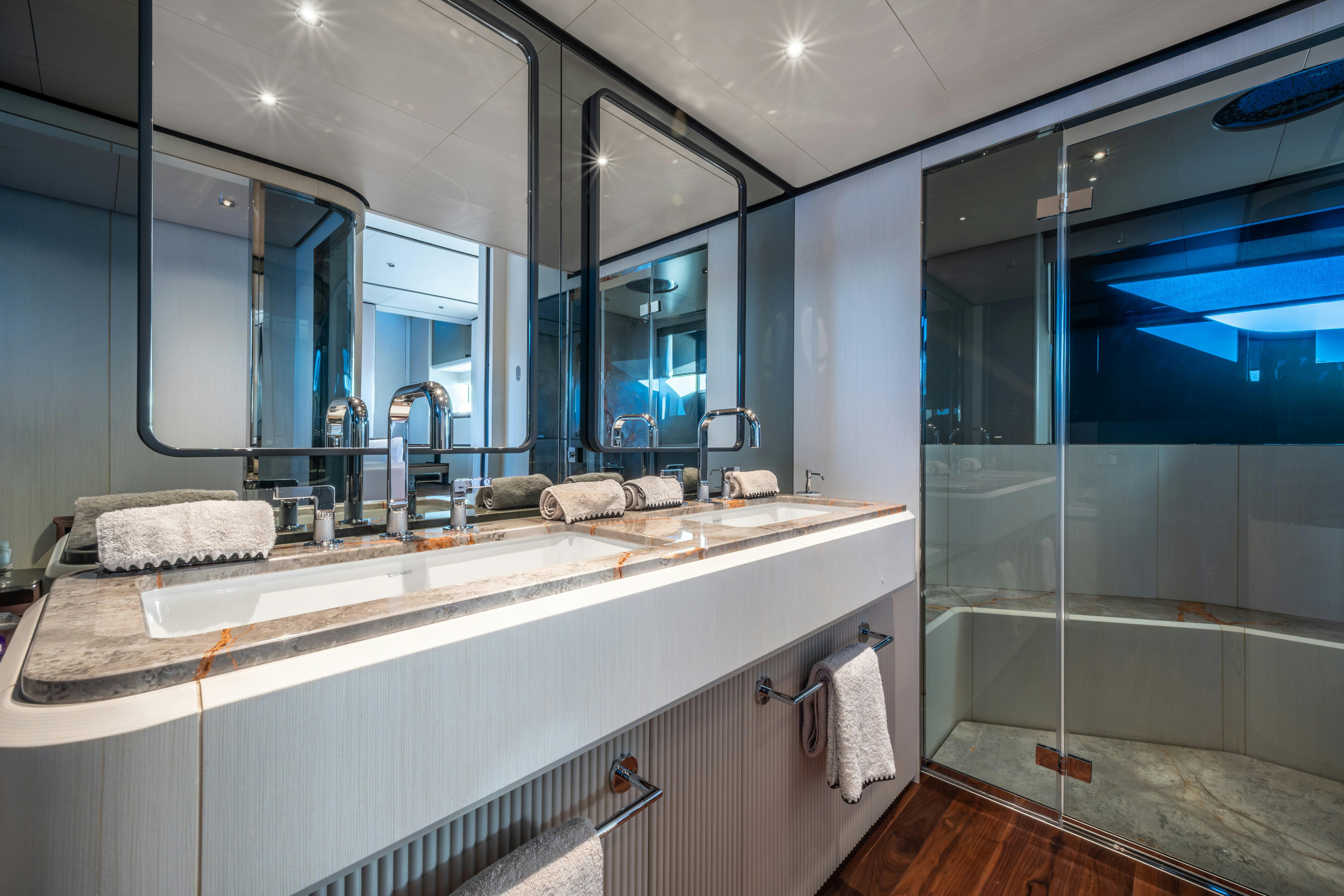 a bathroom with a large mirror aboard TOGETHER Yacht for Sale