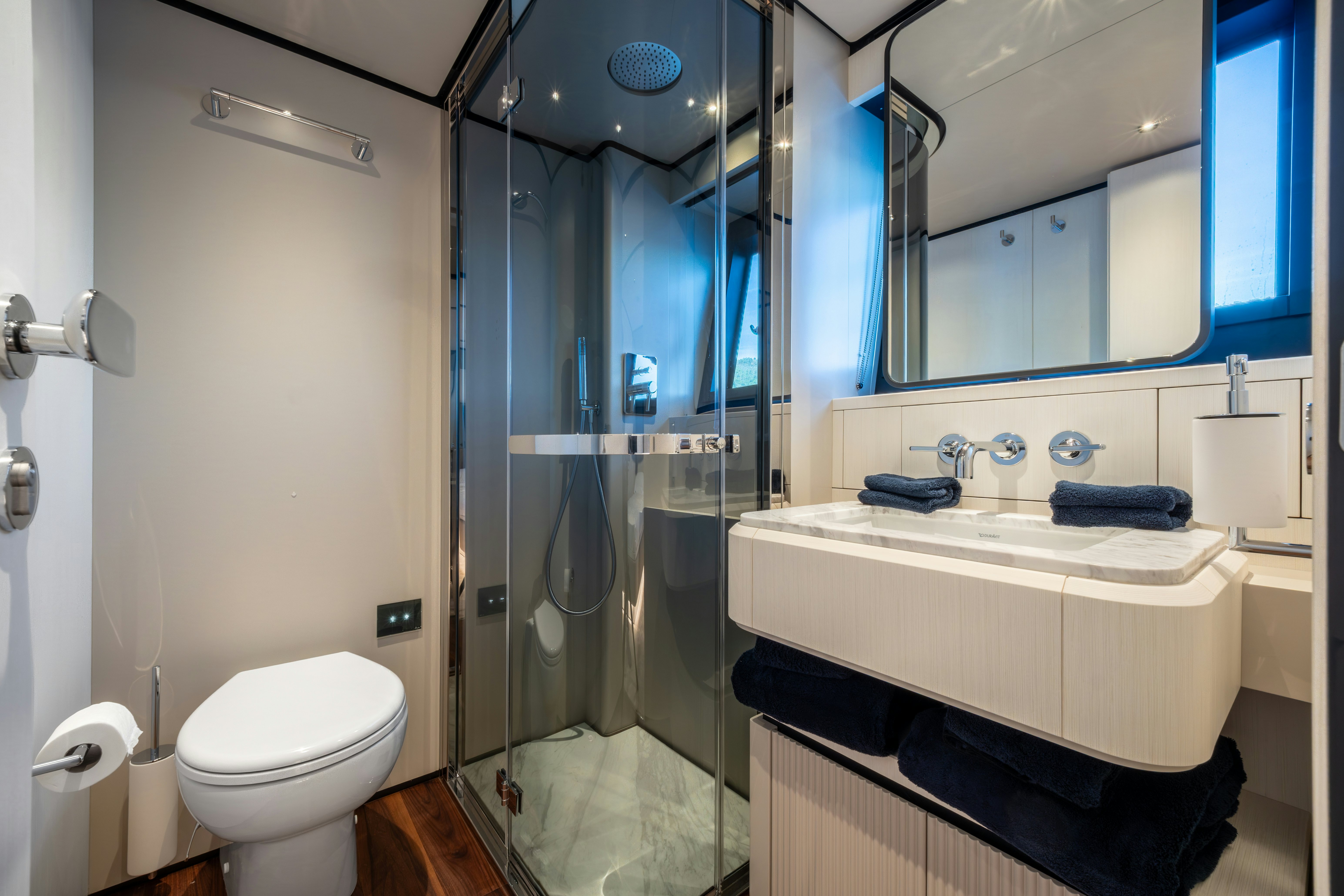 a bathroom with a glass shower aboard TOGETHER Yacht for Sale